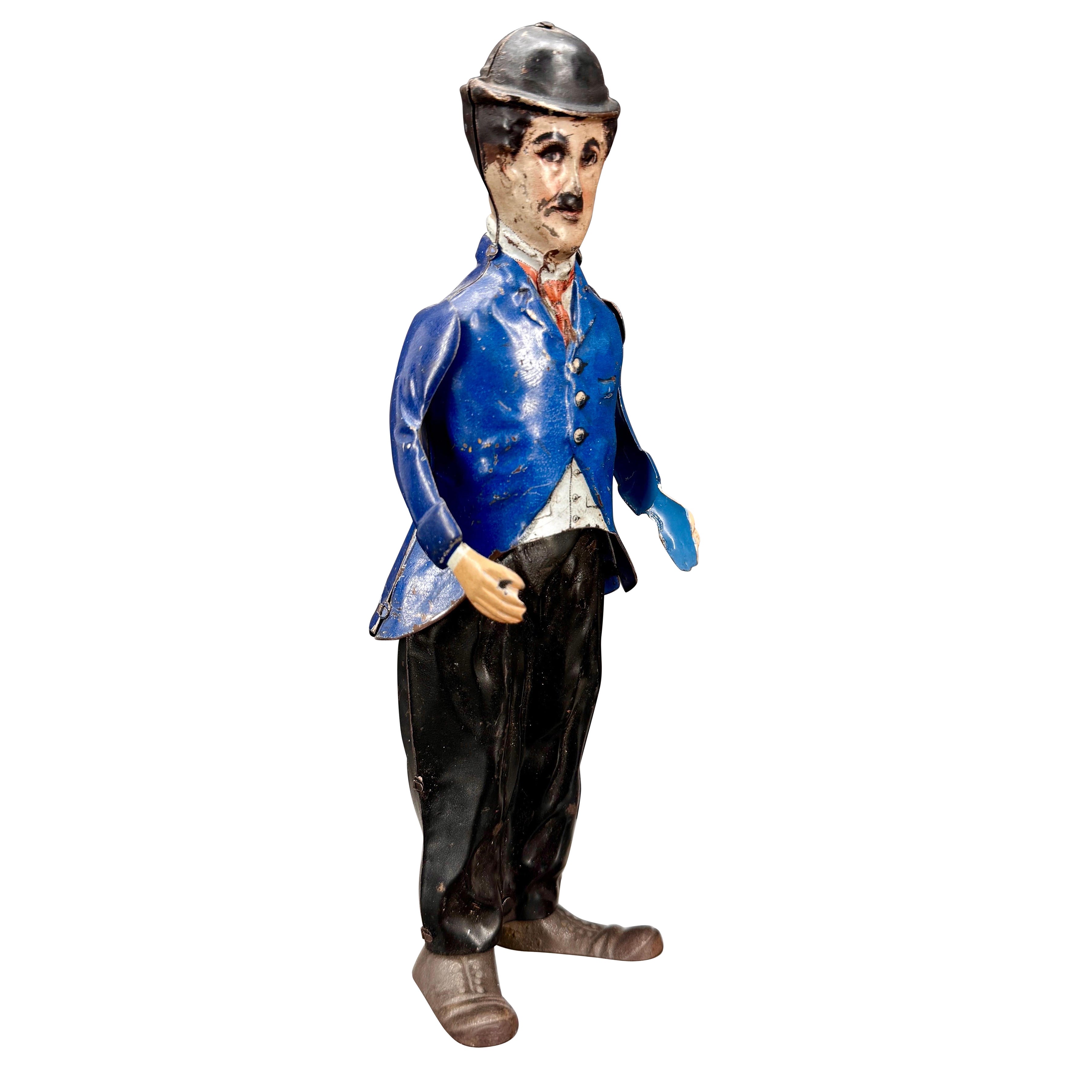 1915 I. A. B. Charlie Chaplin Litho en fer-blanc Figurine à remonter Jouet en vente