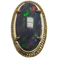 Vintage 19.15 Carat GIA Midnight Black Opal 18 Karat Gold Ring