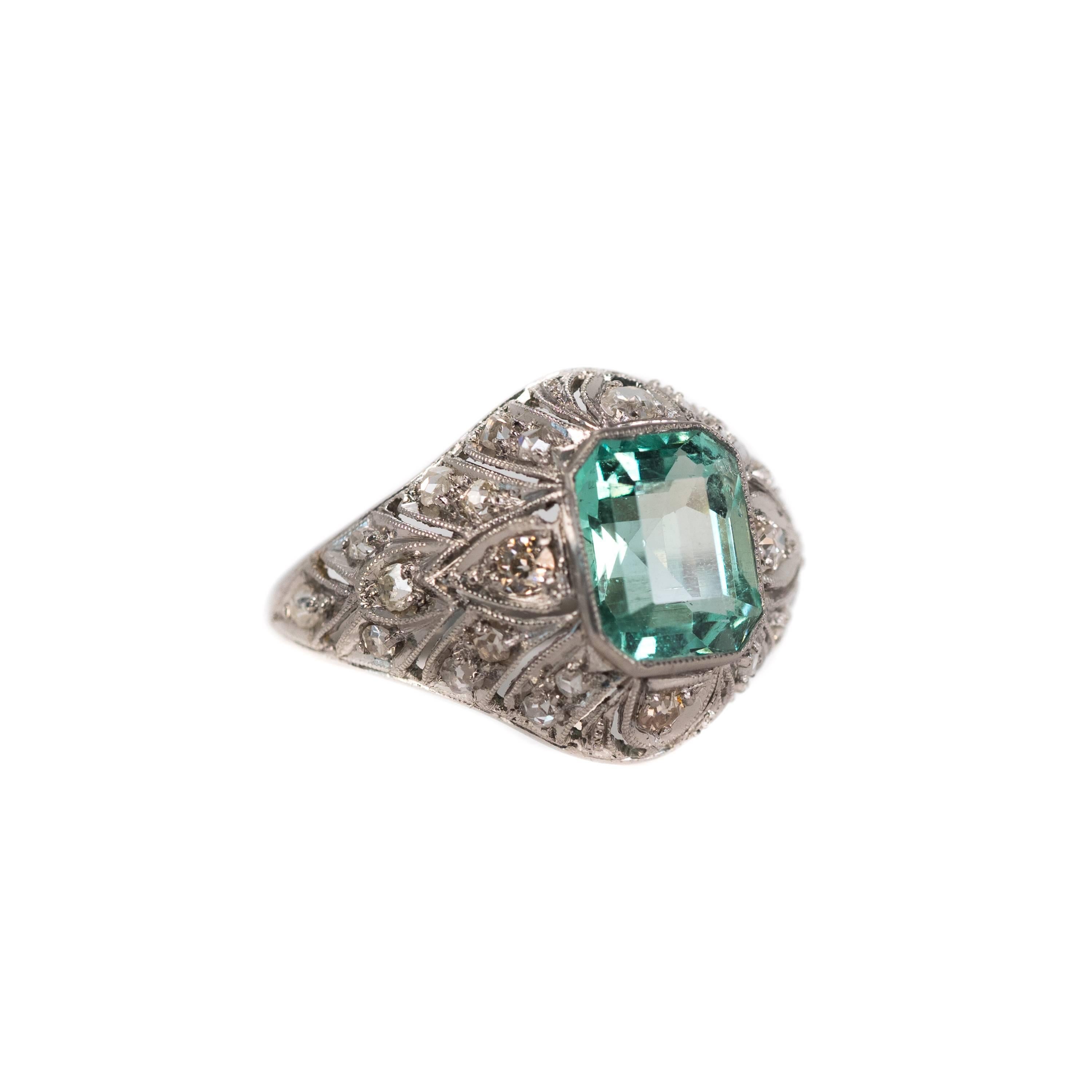 1915 Edwardian 3 Carat Emerald Engagement Ring - Platinum, Colombian Emerald, Diamonds

Features a 3 ct Colombian Emerald center stone, .08 cttw Single cut Diamonds and Platinum. 
The Emerald center stone is exceptionally clear with a very light