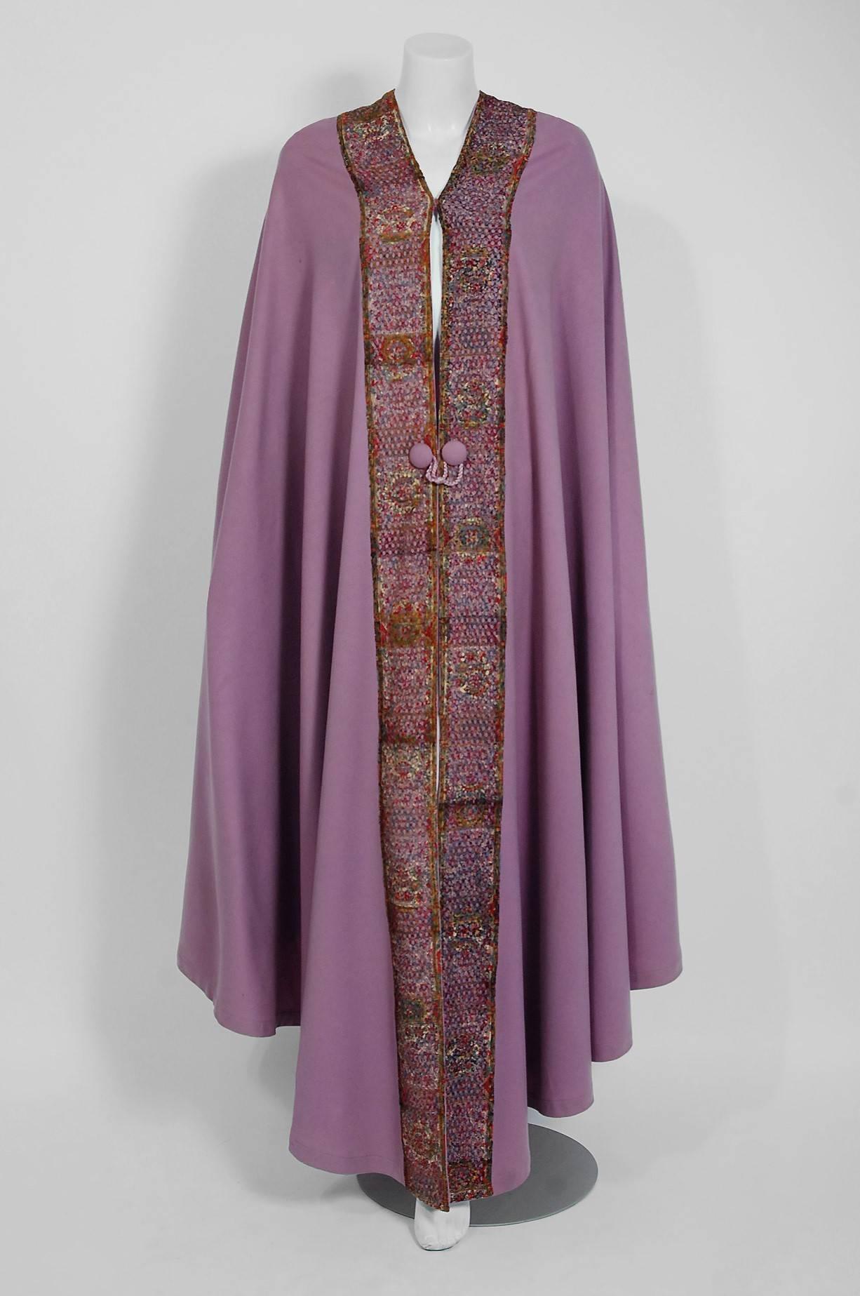 Breathtaking Liberty Paris Couture wool cape dating back to the mid 1910's. Liberty was one of the first designers to embrace the Art-Nouveau movement. The fashion house saw the need to make fashions that were more stylish, but at the same time keep