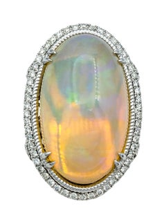 19.16 Carat Oval Cabochon Opal and Diamond Halo Cocktail Ring in 18 Karat Gold