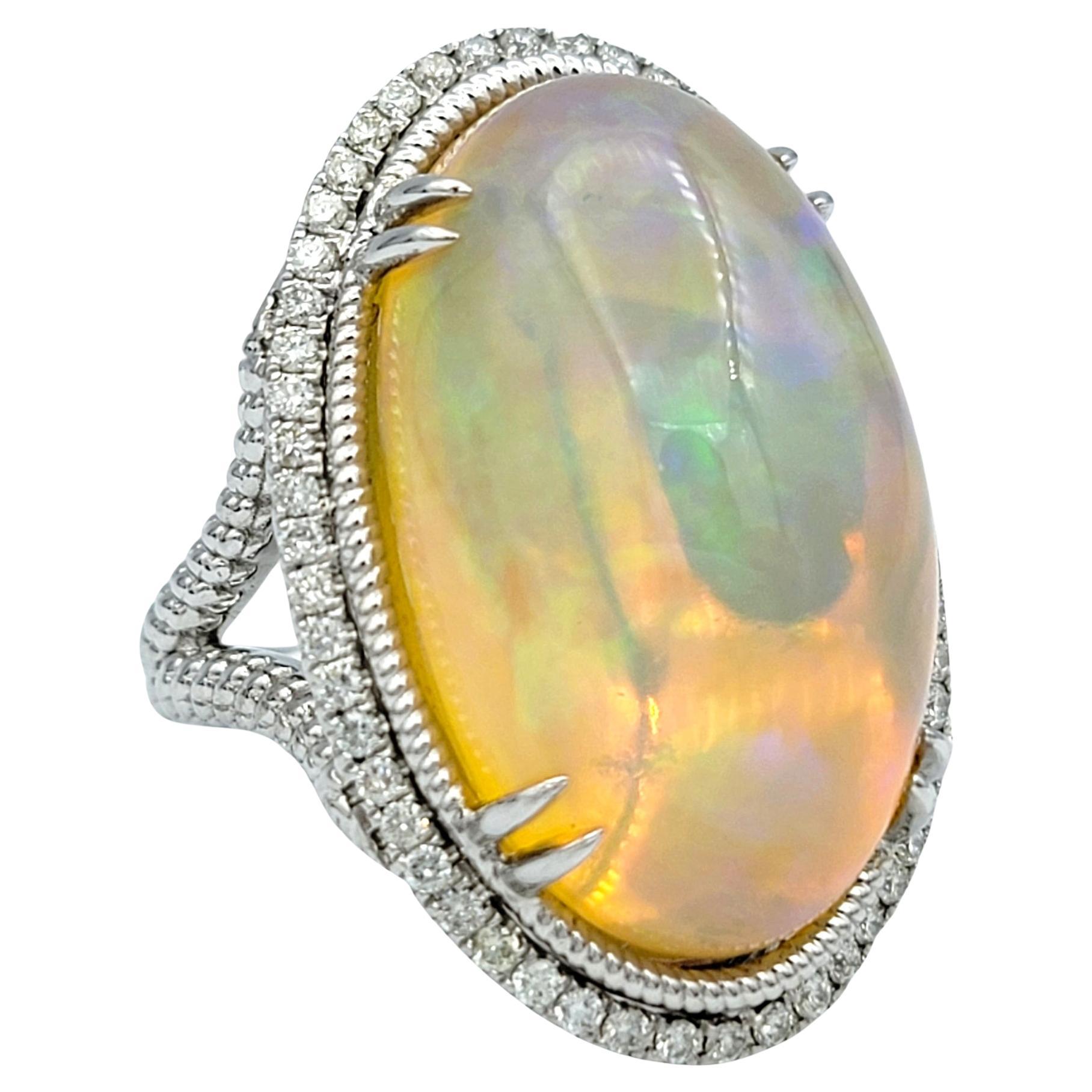 19.16 Carat Oval Cabochon Opal and Diamond Halo Cocktail Ring in 18 Karat Gold