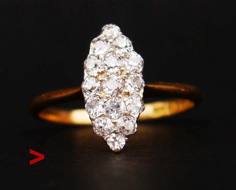 Schöner antiker Art Deco Ring mit handgeschliffenen alten europäischen Diamanten, die in einem ausgefallenen augenförmigen Muster angeordnet sind, Spitzen der Cluster in Platin.

Alle Steine haben offene Rückseiten.

Es gibt 15 Steine mit