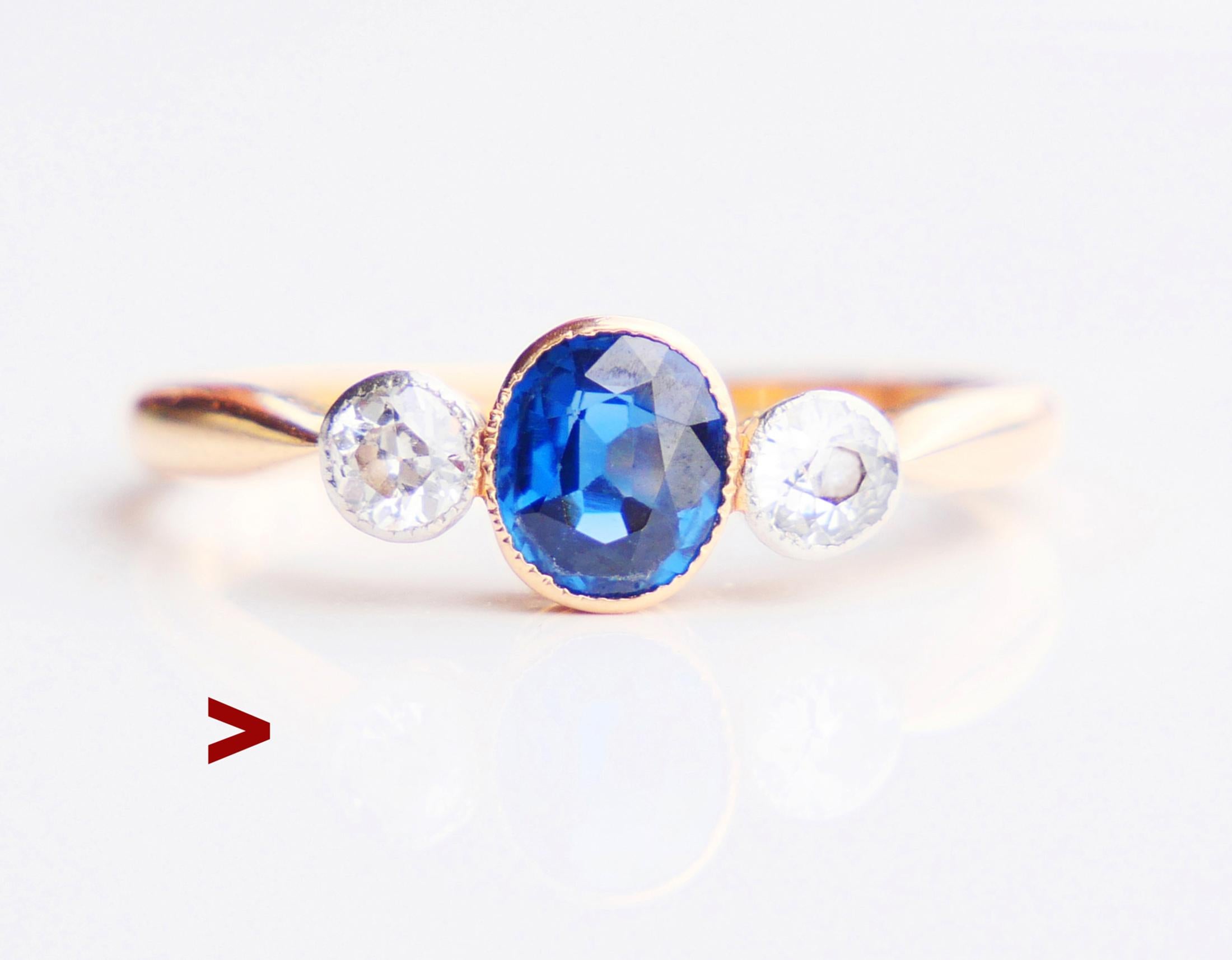 Art Nouveau period three stones Blue Sapphire and Diamonds Ring hand- made in 1918. This design with secure bezel clusters is perfect for everyday/ permanent wear.

Band in solid 18 k Yellow Gold with crown's tops in Platinum.

Crown measures : 12 m