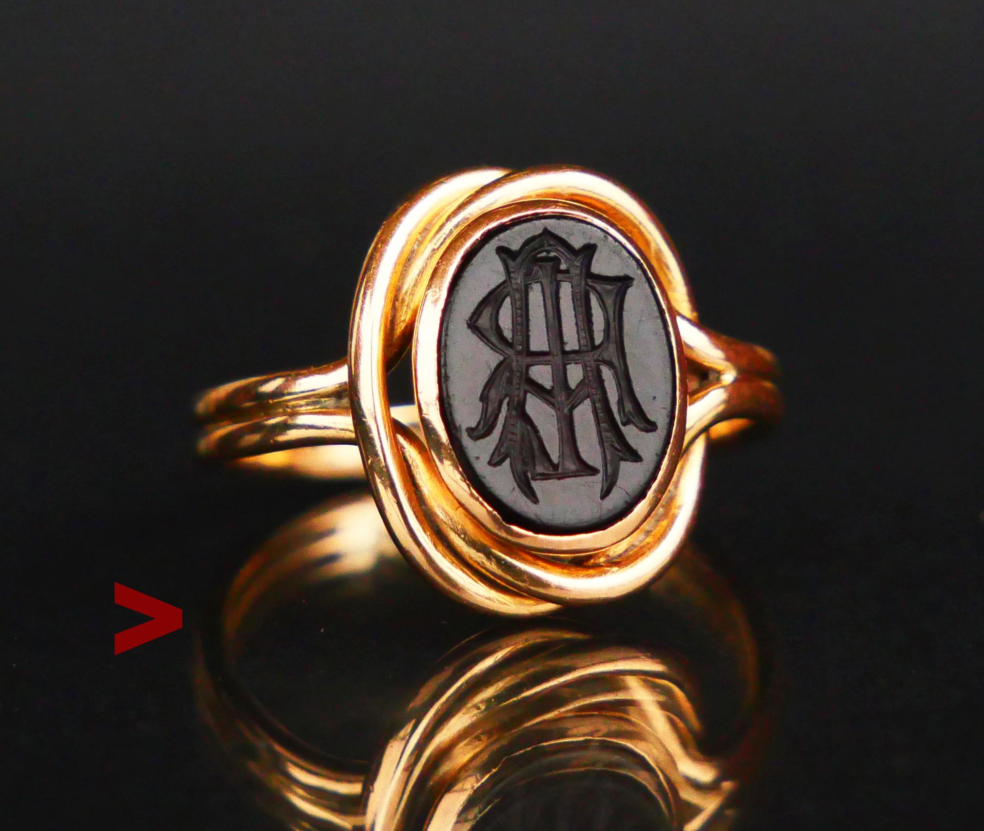 ϟignet Ring from distant 1917 with twisted double wire band adorned with bezel set polished plate of Red Onyx stone 10 mm x 8 mm x 2.8 mm / ca 3.5 ct. The crown measures 14 mm x 11 mm x 4 mm deep.

The design of this ring is unisex, it will look