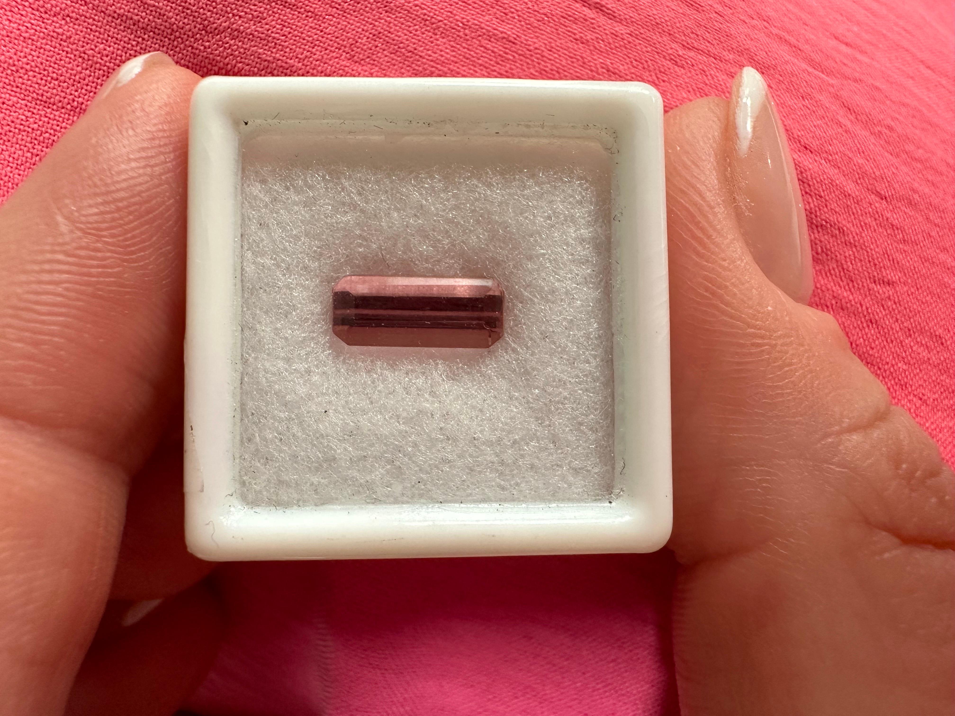Stunning pink topaz, loose and unset, will come with a certificate of authenticity.

NATURAL GEMSTONE(S): TOPAZ (IMPERIAL)
Clarity/Color: Slightly Included/Pink
Cut: Rectangular
Treatment: none


WHAT YOU GET AT STAMPAR JEWELERS:
Stampar Jewelers,