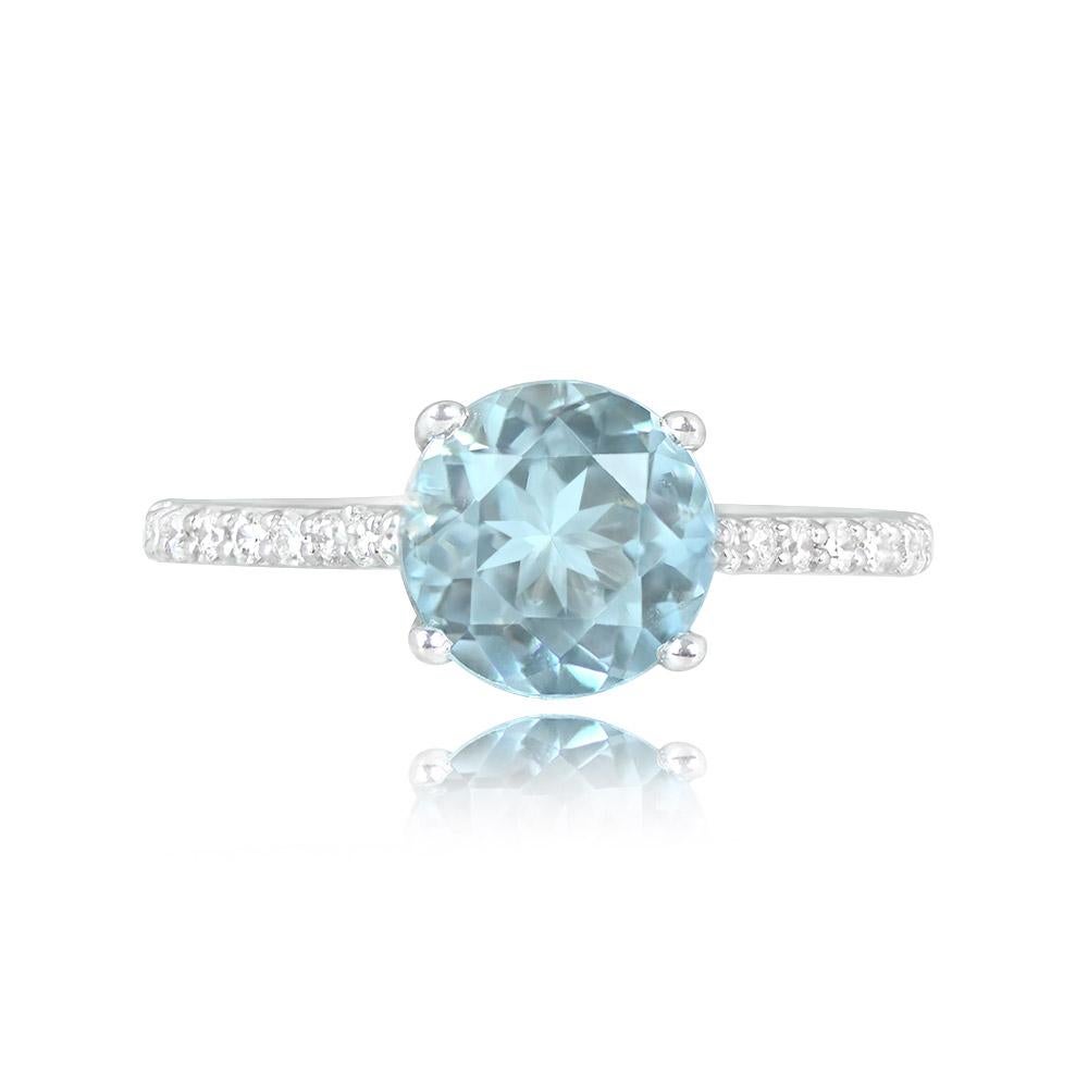 This ring highlights a 1.91-carat round aquamarine, prong set in the center, with shoulders adorned by round brilliant cut diamonds totaling around 0.22 carats. The elegant setting is crafted in 18k white gold.


Ring Size: 6.5 US, Resizable
Metal: