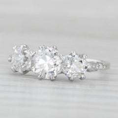 Diamante rotondo a 3 pietre in oro bianco 14k da 1,91 carati, misura 6,25 per l'impegno.