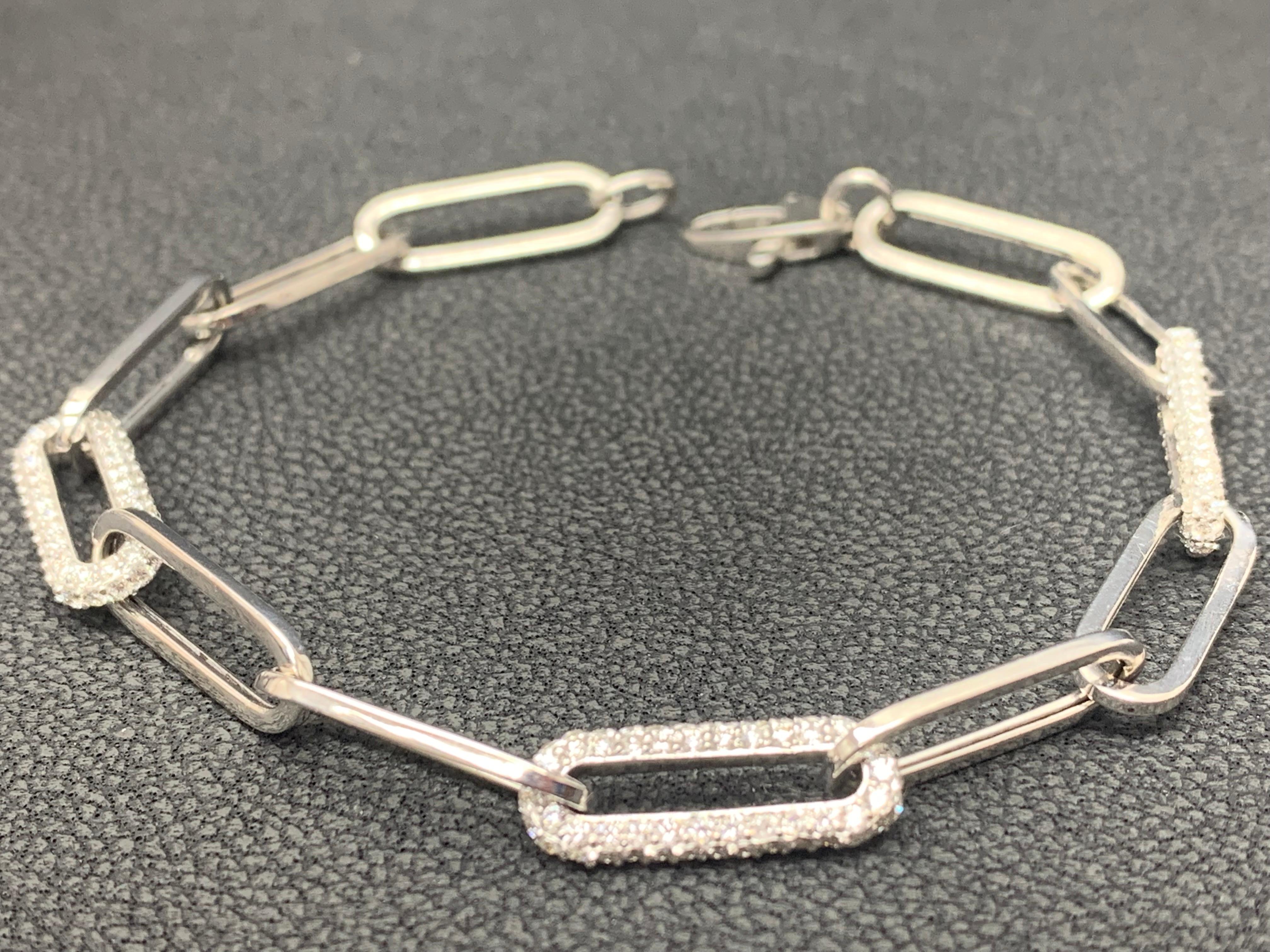 This Elegant & Beautiful 14K White Gold Bracelet featuring 3 diamond clips towards the center weighs 1.92 carats  with a lobster clasp.


All diamonds are GH color SI1 Clarity.
Available in Rose and Yellow as well.
Style available in different price
