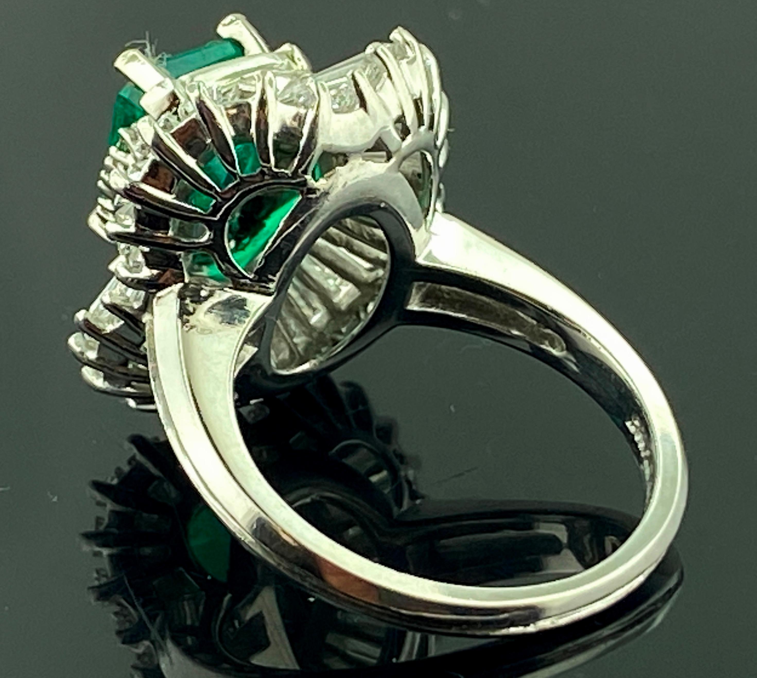 Emerald Cut 1.92 Carat Emerald and Diamond Ring in Platinum For Sale