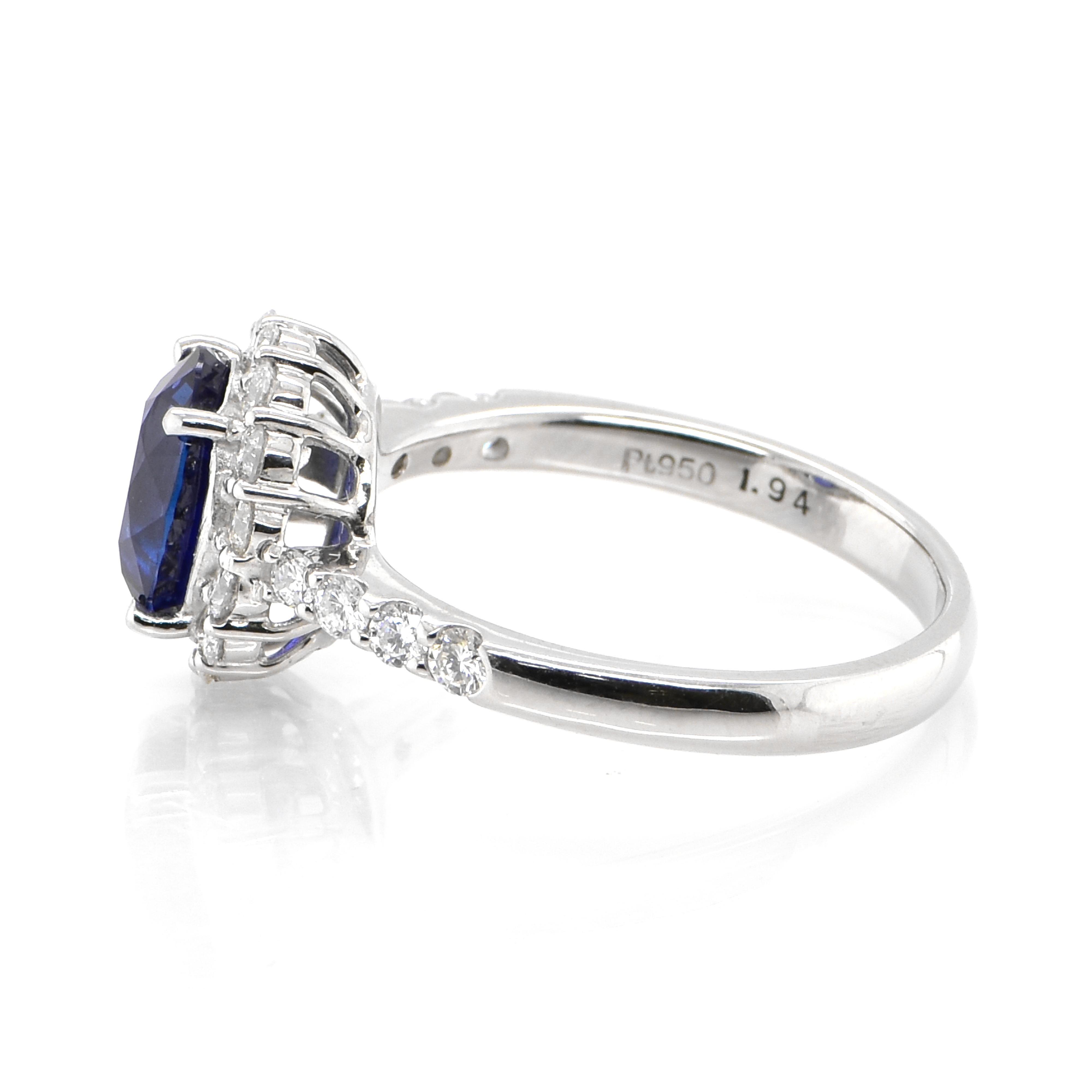 Oval Cut 1.92 Carat Natural Royal Blue Sapphire and Diamond Halo Ring Made in Platinum For Sale