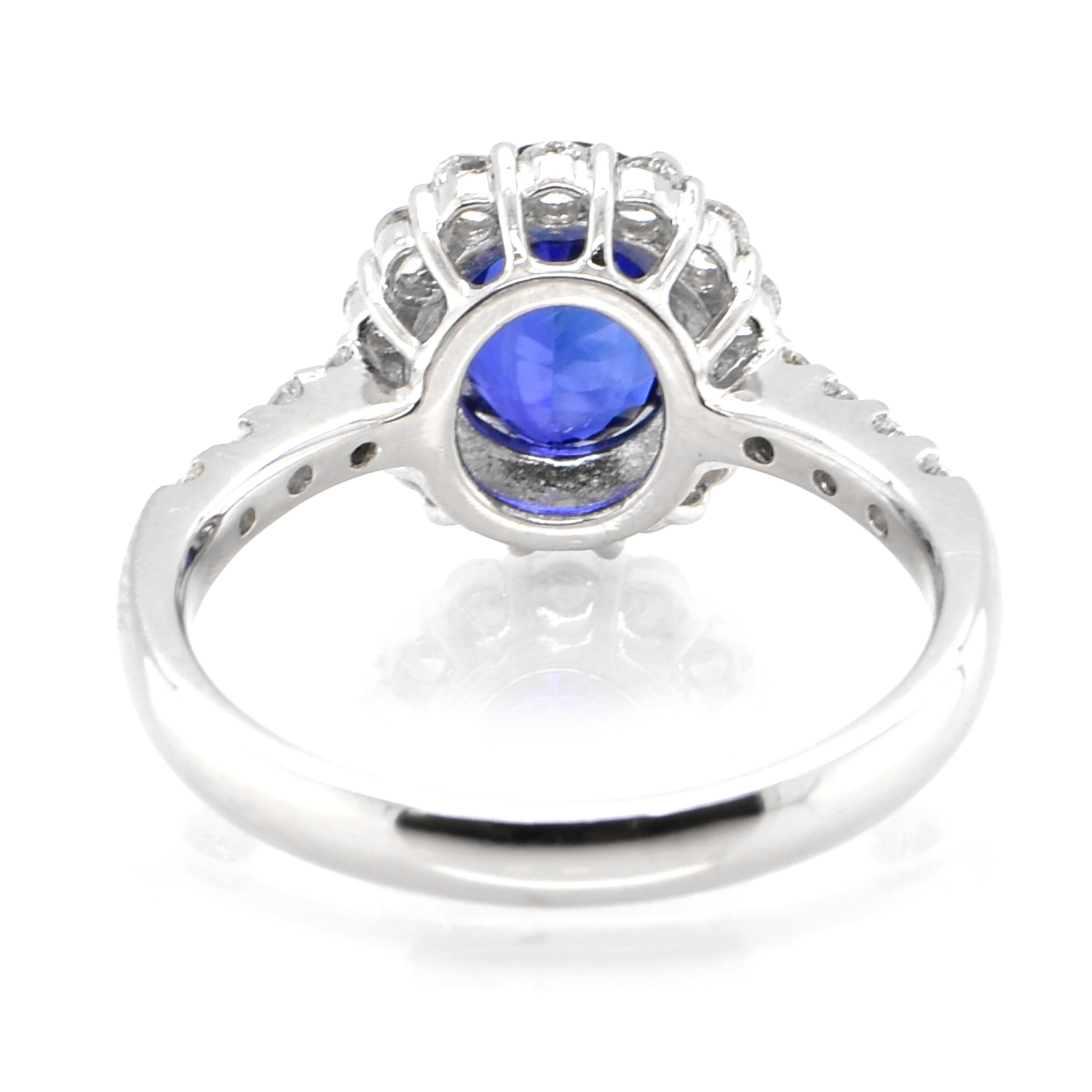 Women's 1.92 Carat Natural Royal Blue Sapphire and Diamond Halo Ring Made in Platinum For Sale