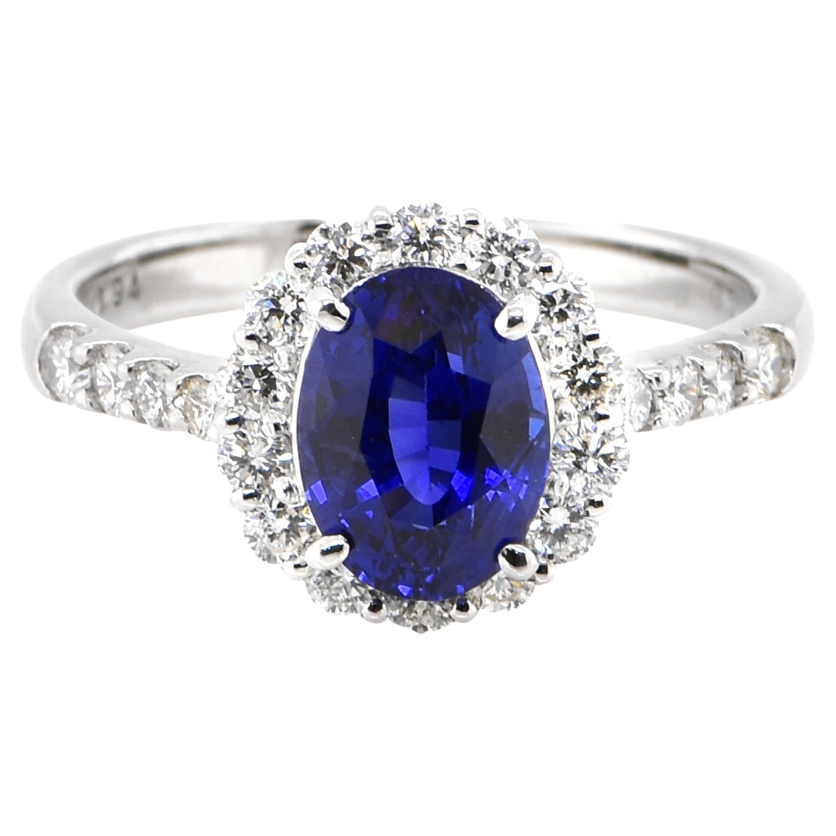 1.92 Carat Natural Royal Blue Sapphire and Diamond Halo Ring Made in Platinum