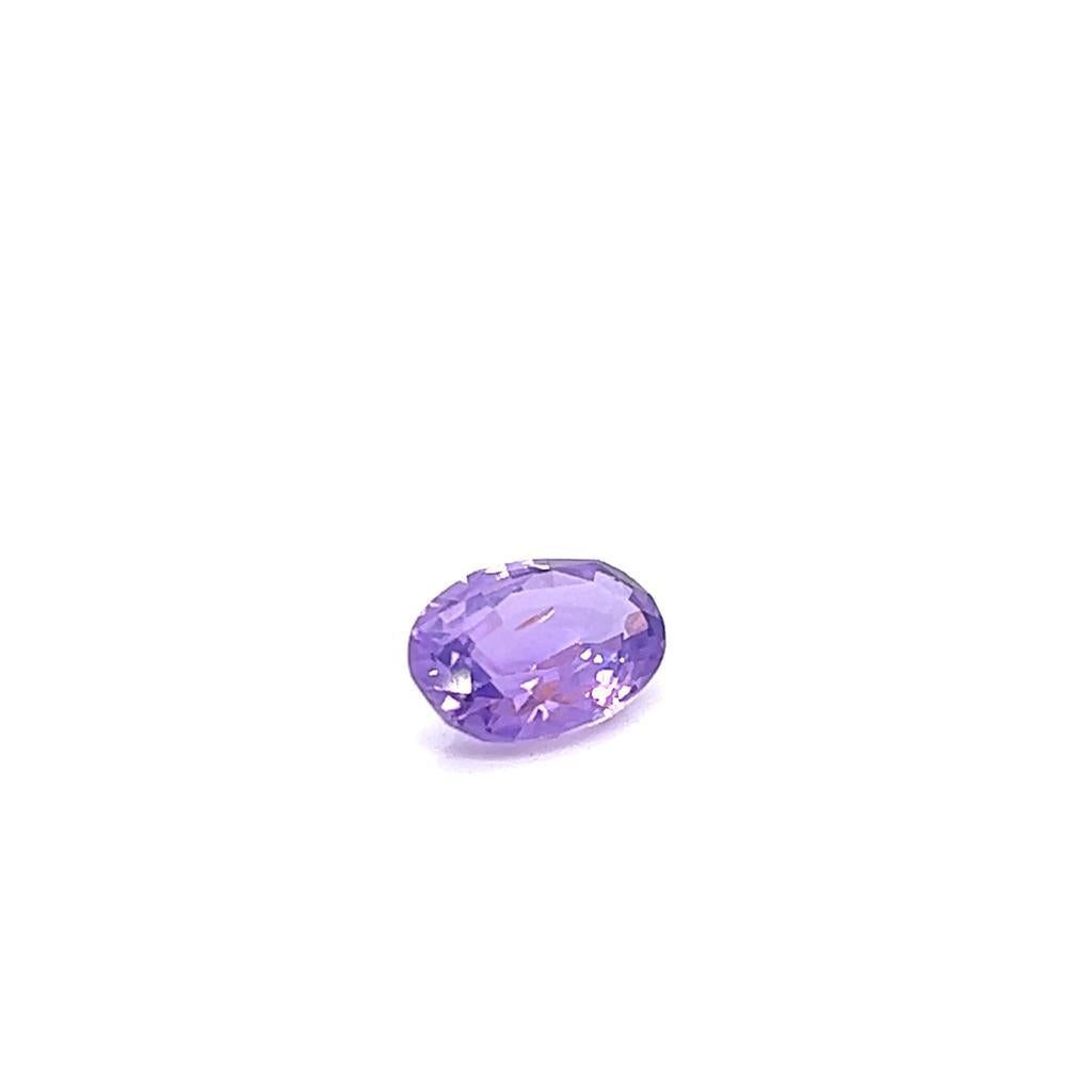 1.92 Carat Oval cut Purple Sapphire
This exquisite Oval cut Purple Sapphire weighs 1.92 carats and has alluring, vivid purple hues.
It measures 9.5mm by 6.4mm by 3.6mm, and has a lovely spread.

It is the perfect candidate for a collection of