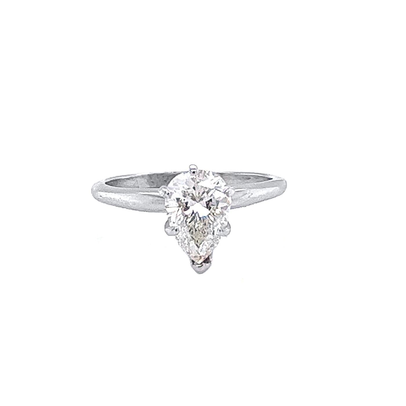 This Magnificent 1.92 ct Pear Shape H/Si1 Diamond Ring is the ideal spot to start if you want to make the best decision. The magnificent Pear Shape setting holds the diamond's bright shine, which has a sparkling appearance. Maximum shine for a woman
