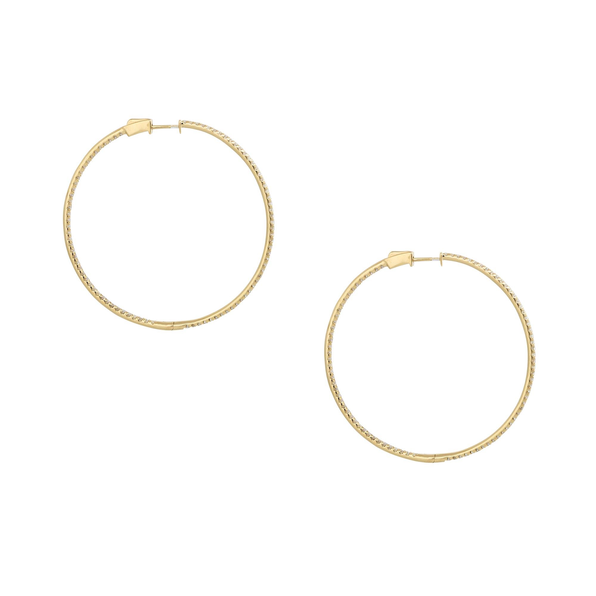 18 Karat Yellow Gold 1.92 Carat Round Brilliant Cut Diamond Large Hoop Earrings

Material: 18k Yellow Gold
Diamond Details: There are approximately 1.92 carats of Round Brilliant cut Diamonds. All diamonds are approximately G/H in color and