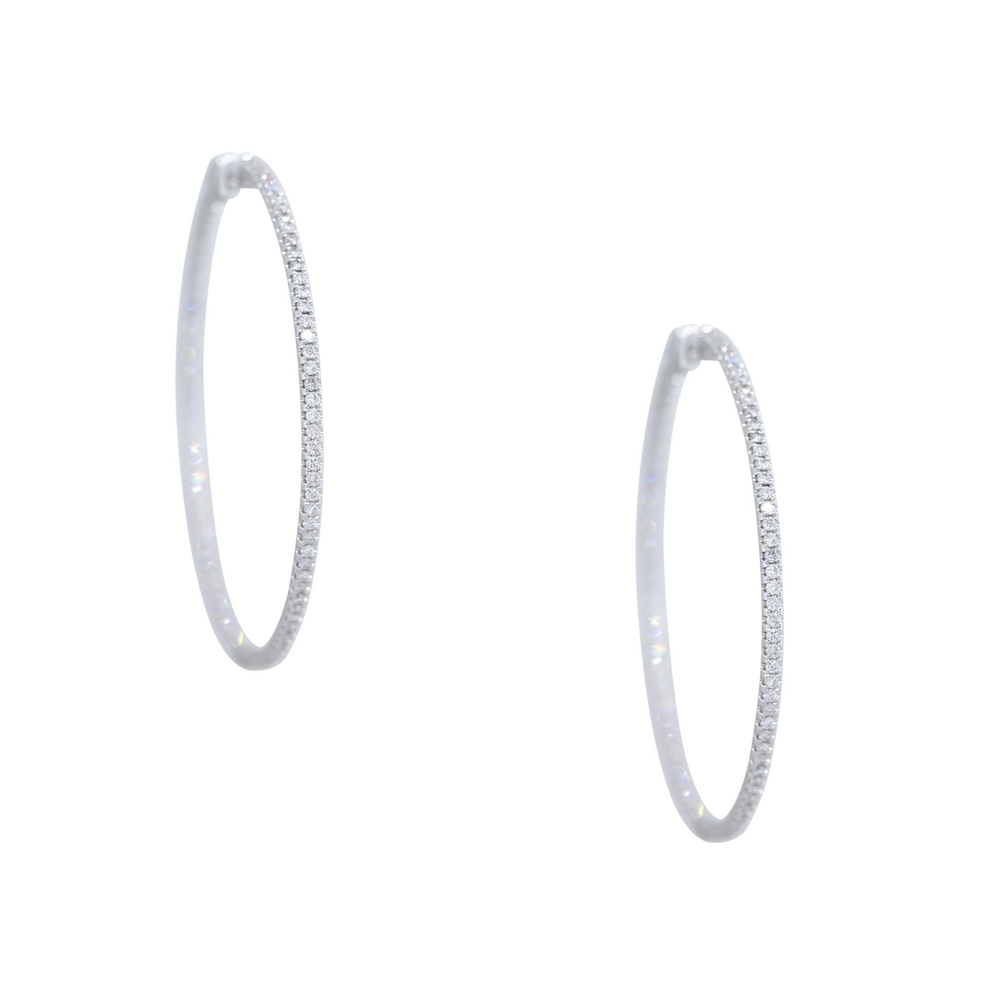 18 Karat White Gold 1.92 Carat Round Brilliant Cut Diamond Large Hoop Earrings

Material: 18k White Gold
Diamond Details: There are approximately 1.92 carats of Round Brilliant cut Diamonds. 
Diamond Color: All diamonds are approximately G/H in