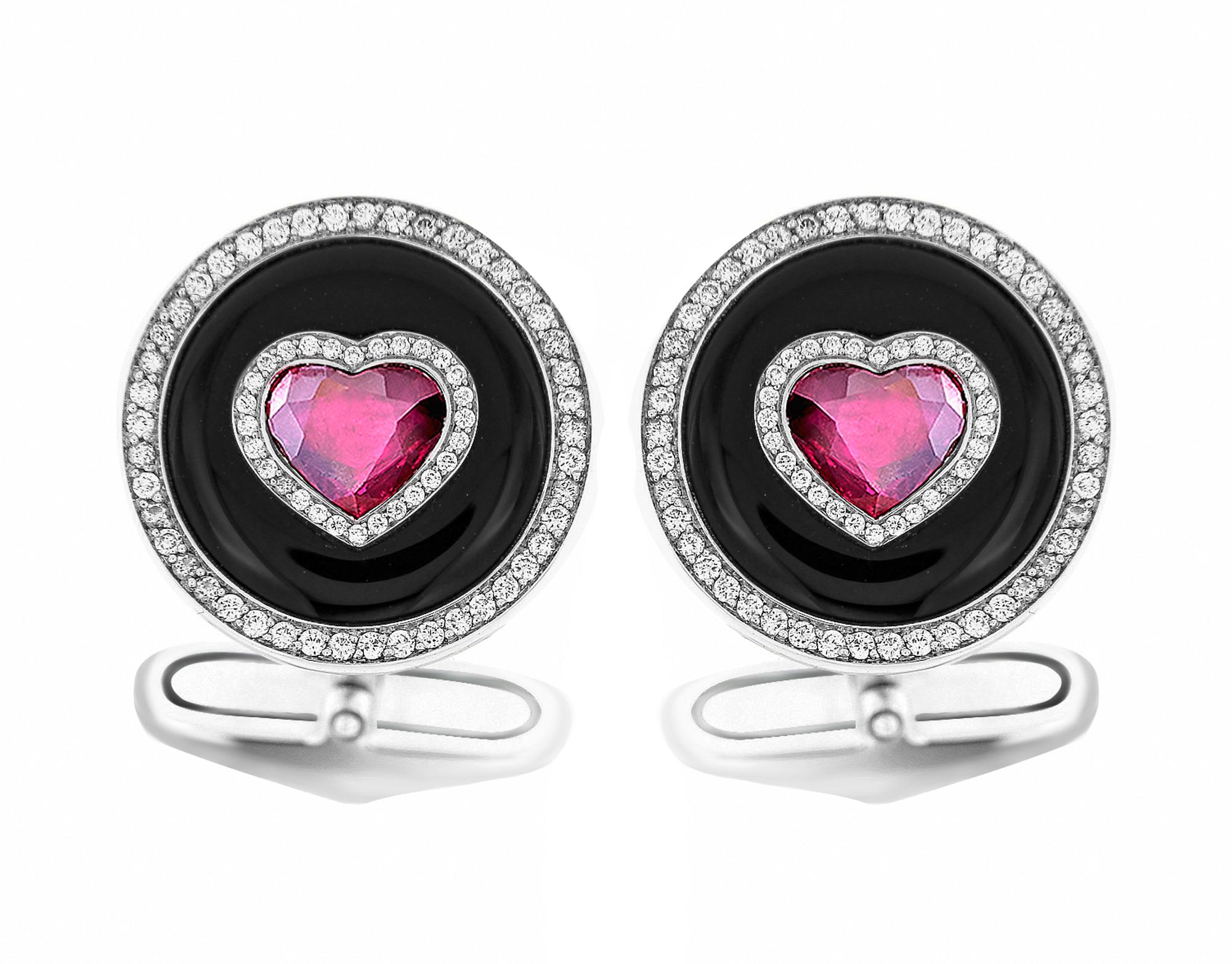 This pair natural 1.92ct heart-shaped ruby is the star of this ring. 5.37cts of carved black onyx sits around the rubies and it further enhanced with .50cts of pave'd high quality diamonds. 

This a one of a kind item. 


Heart Shaped Ruby - 1.92