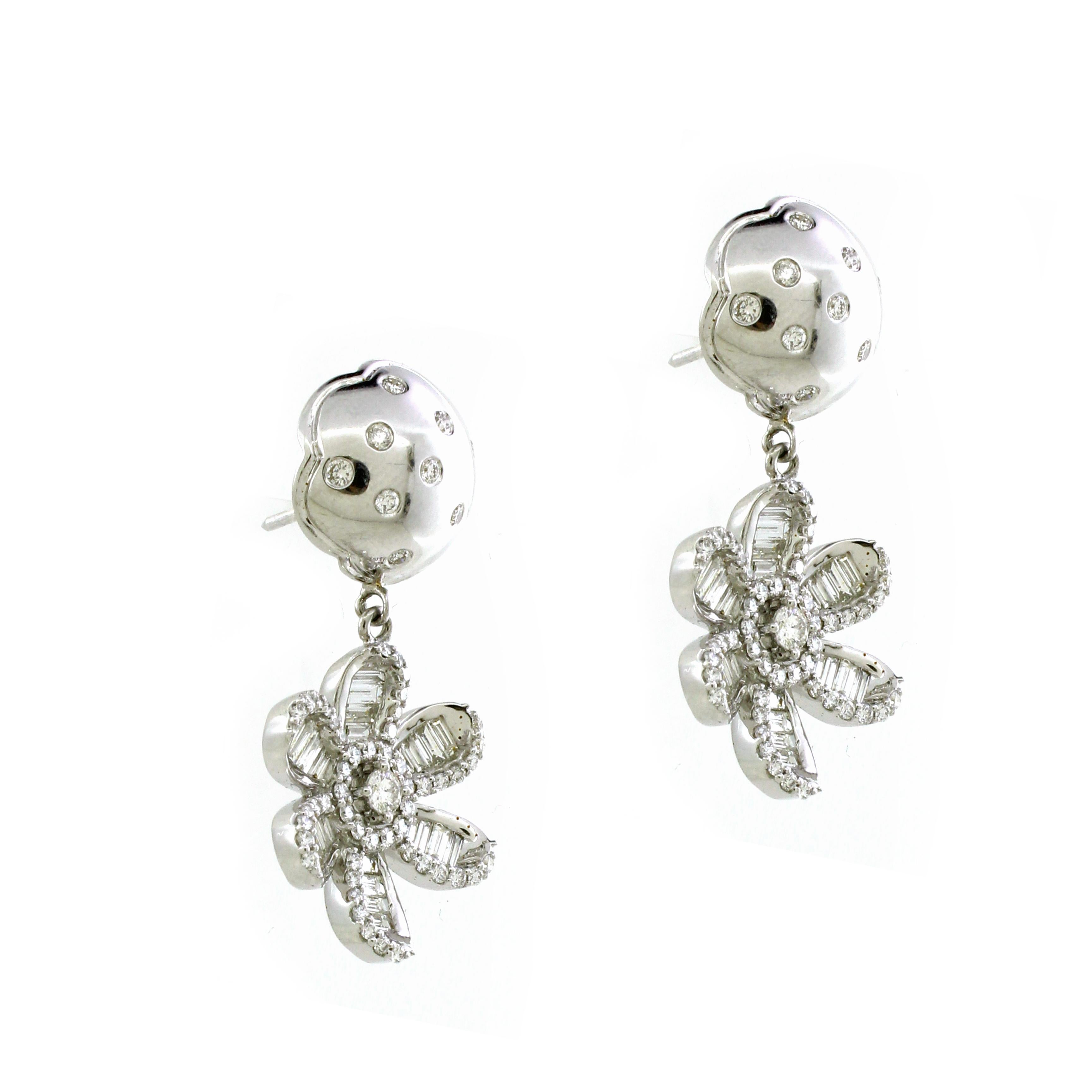 Introducing our Floral Blossom Diamond Earrings, a captivating blend of elegance and charm inspired by the delicate beauty of flowers. These statement earrings feature a total of 1.92 carats of dazzling white round diamonds, comprised of 1.62 carats