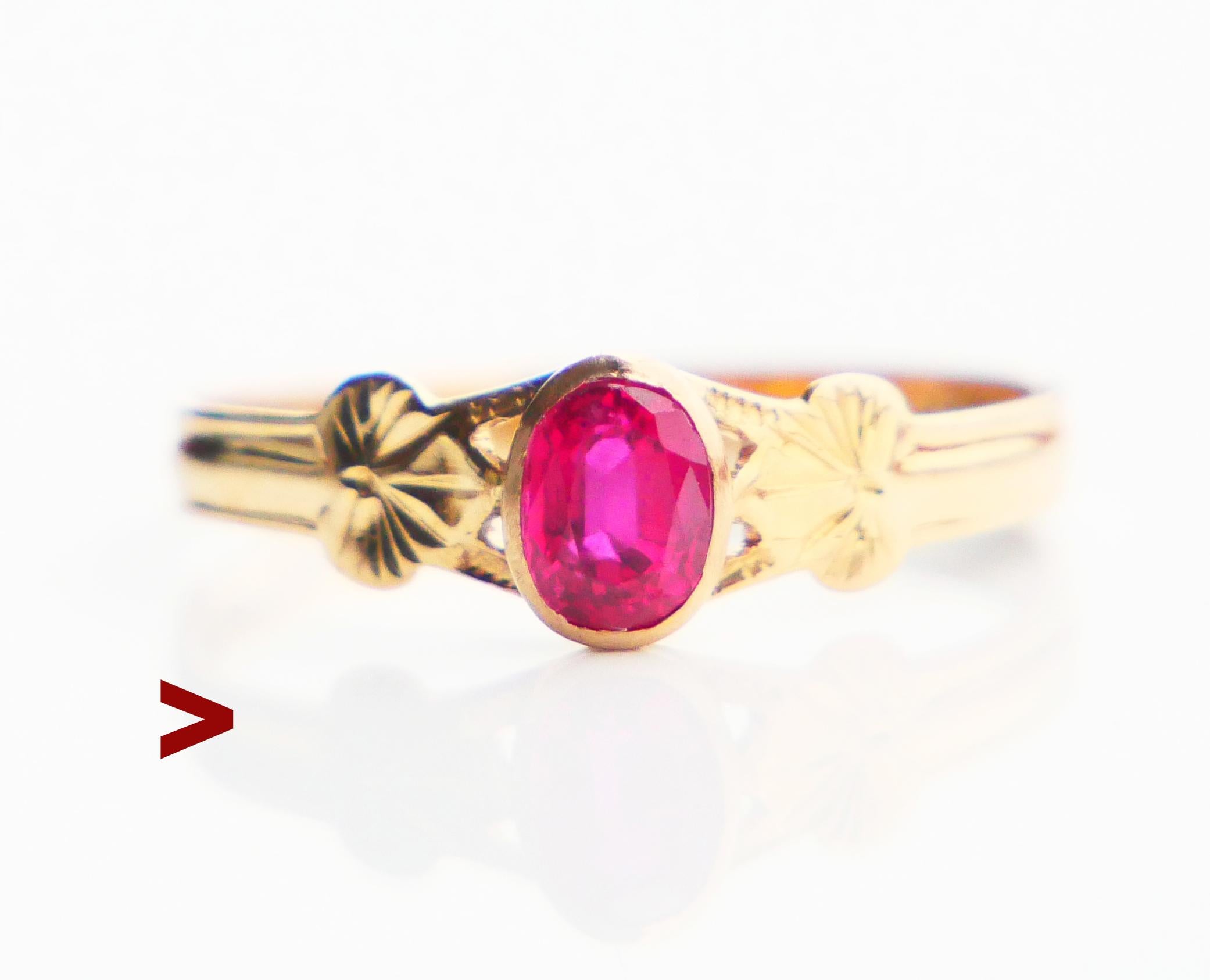 A Ring from distant Art- Deco period, engraved band in solid 18K Yellow Gold with bezel set oval cut natural Red Ruby 5 mm x 4 mm / ca. 0.5 ct. Stone has internal inclusions.

Hallmarked 18K ,maker is GD&Co , year combination S7 / made in Sweden in