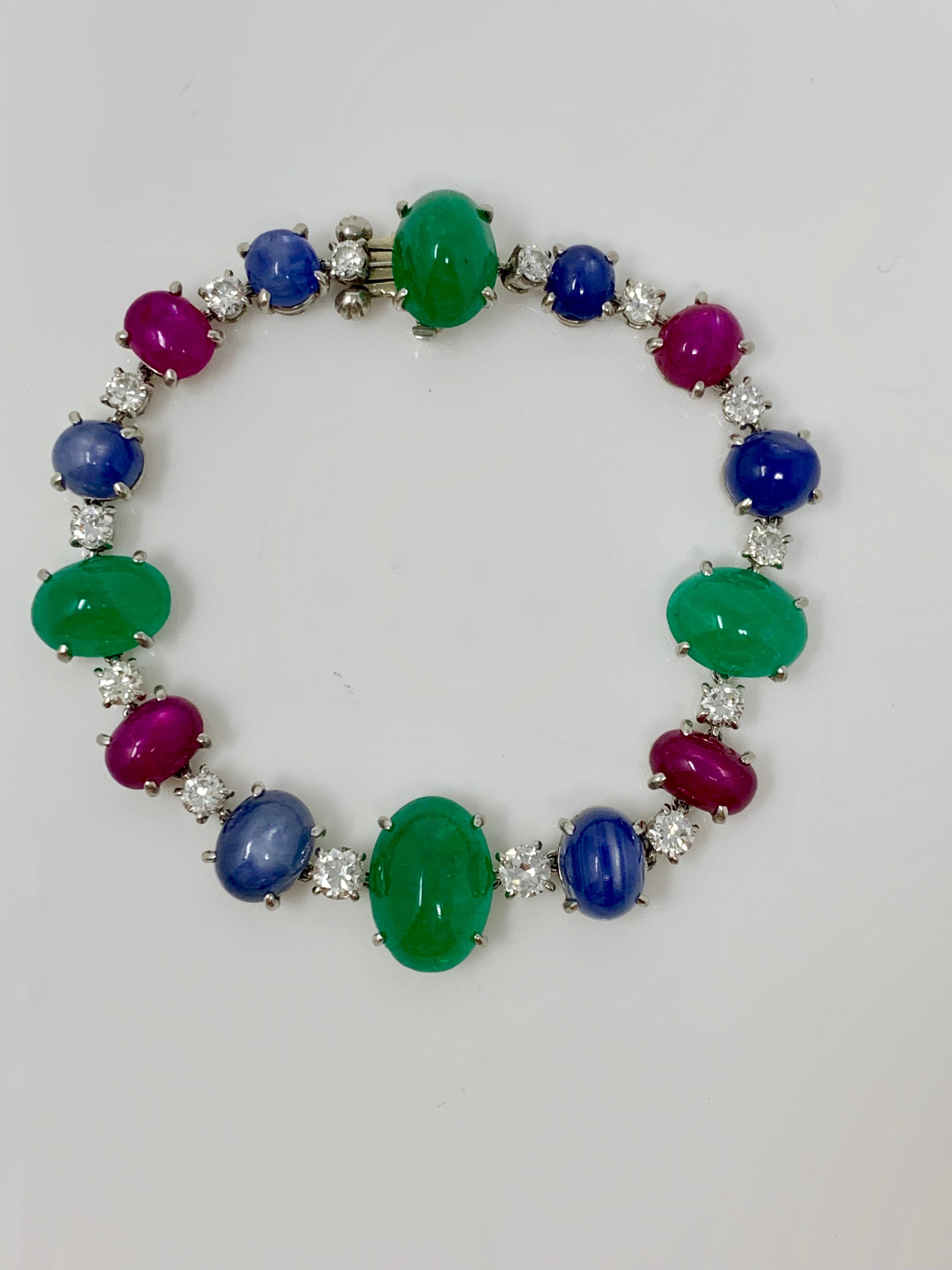 Contemporary 1920 Antique 32.50 Carat Emerald, Blue Sapphire, Ruby and Diamond Bracelet