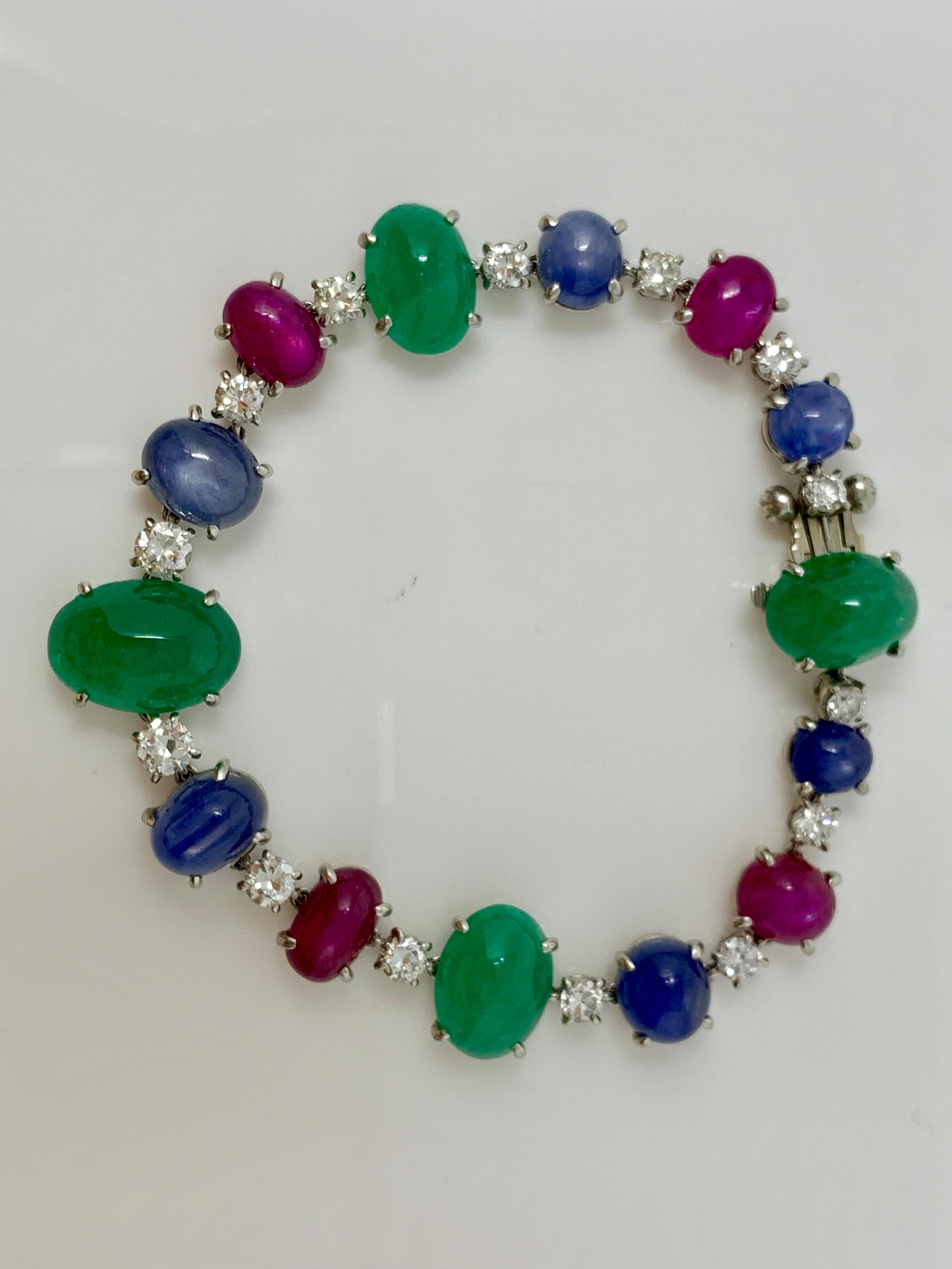 Oval Cut 1920 Antique 32.50 Carat Emerald, Blue Sapphire, Ruby and Diamond Bracelet