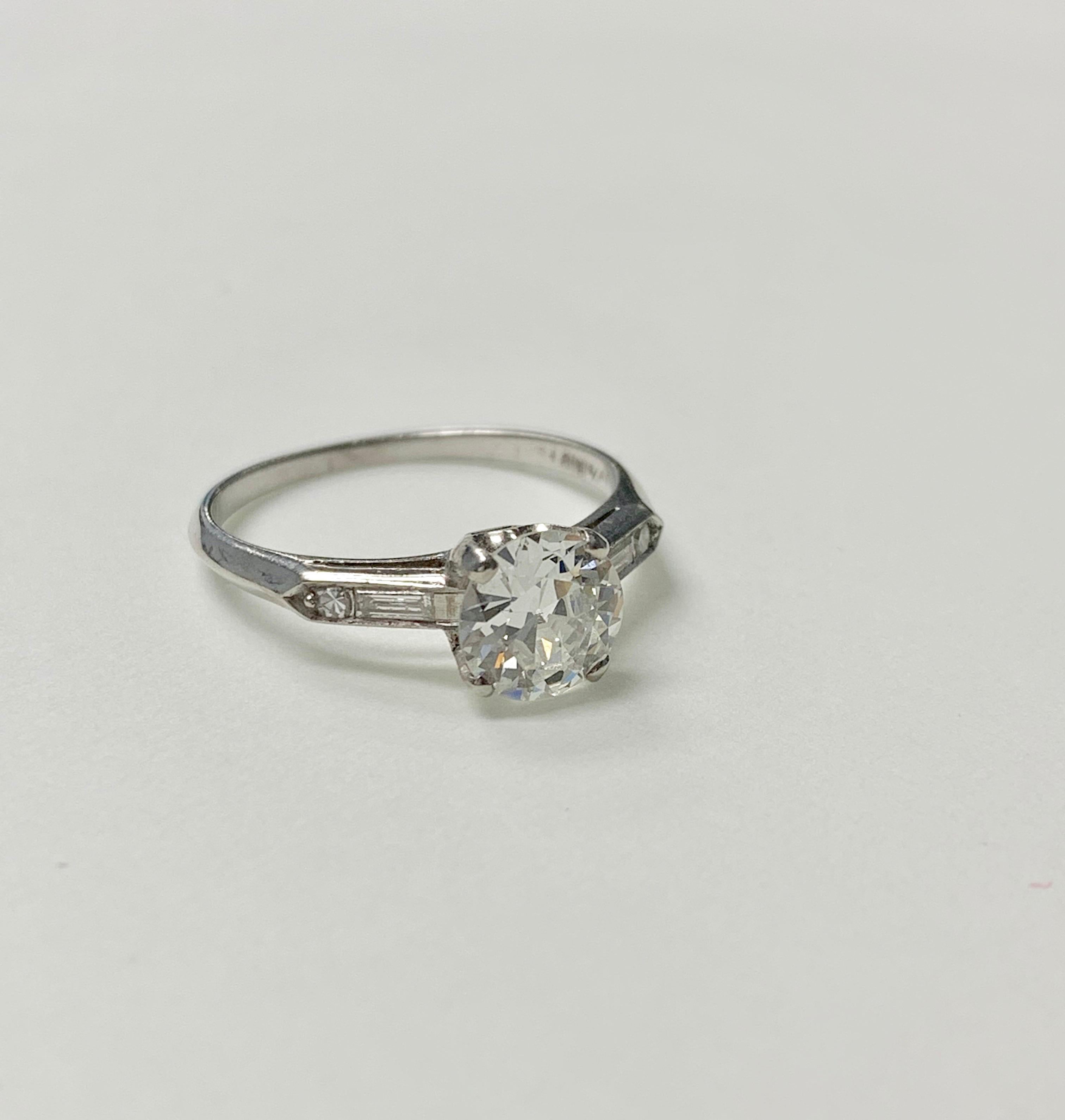 1920 Antique Old European Cut Diamond Engagement Ring In Platinum. 
The details are as follows : 
Diamond weight : 0.96 carat ( I VS ) 
Diamond weight : 0.10 carat  ( small diamonds ) 
Metal : Platinum 
Size : 6 
