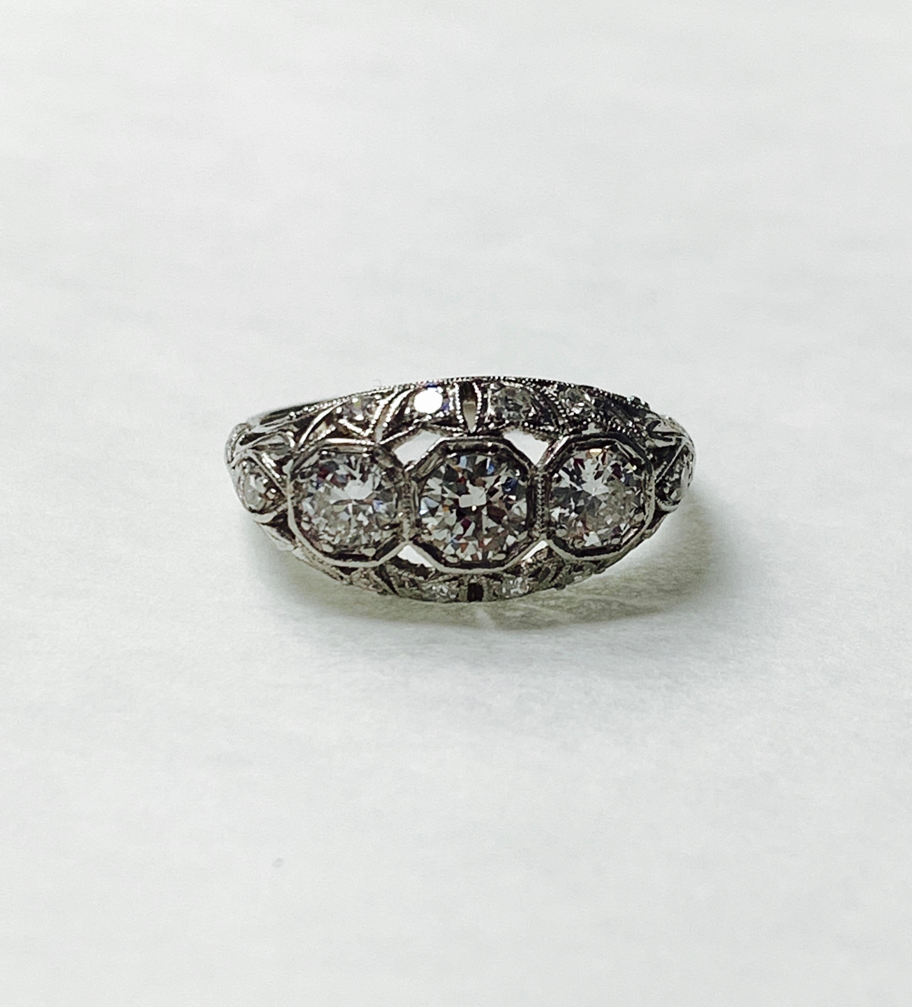1920 Antique three stone old european cut diamond ring hand crafted in platinum. 
The details are as follows ; 
Diamond weight : 1 carat 
Metal : Platinum 
Ring size : 6 3/4 

