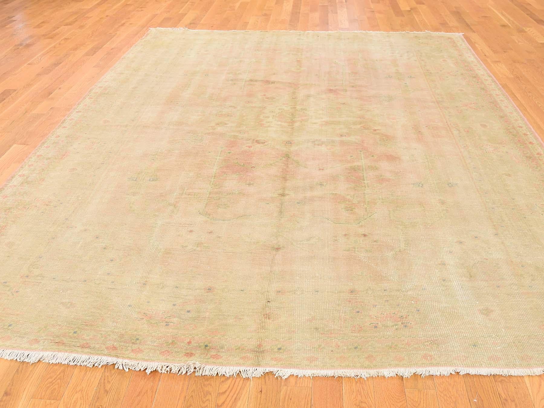 This is a genuine hand knotted oriental rug. It is not hand tufted or machine made rug. Our entire inventory is made of either hand knotted or handwoven rugs.

Revive your home style with this beautiful hand knotted carpet. This handcrafted antique