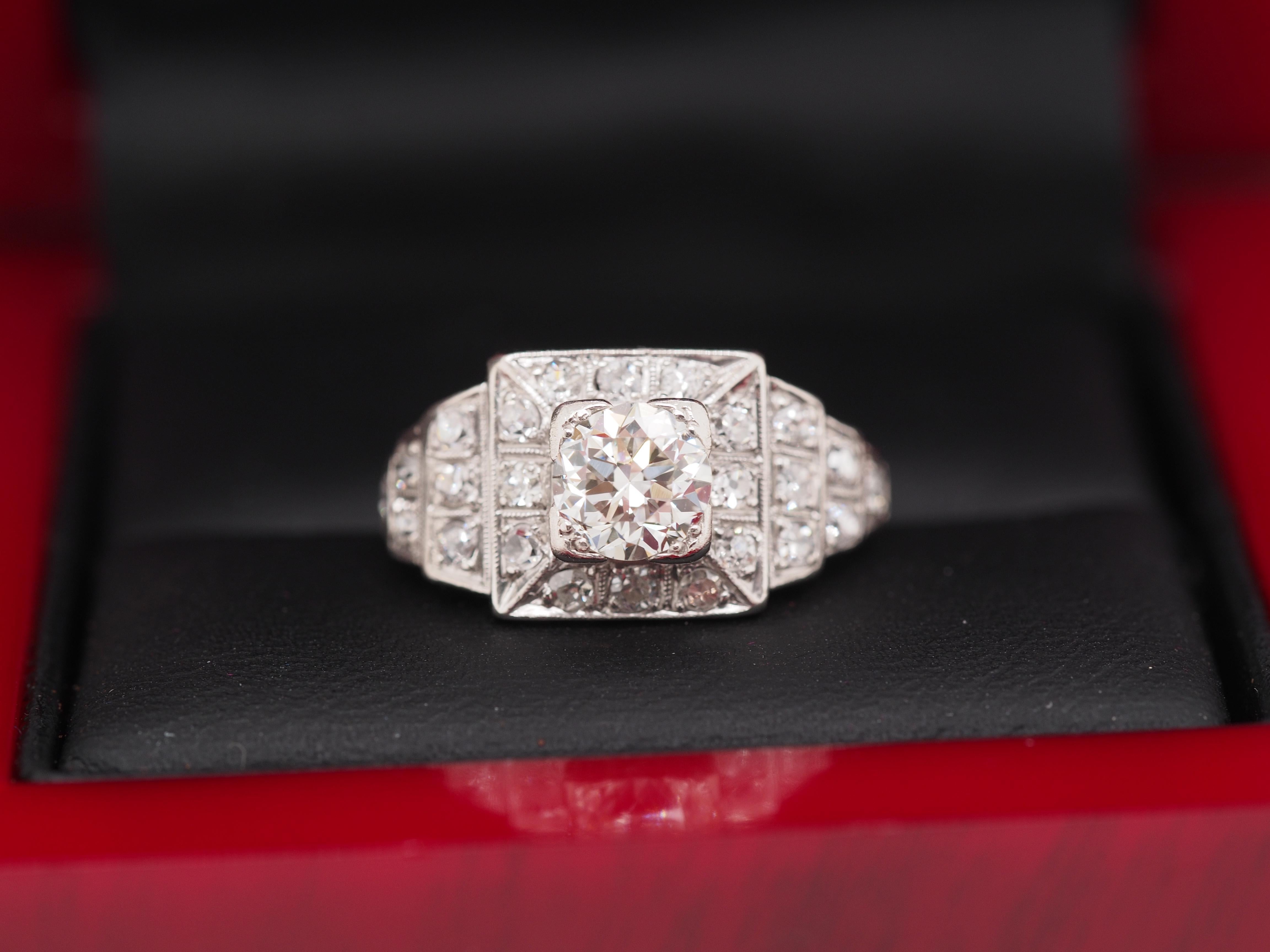 Year: 1920

Item Details:
Ring Size: 3.25
Metal Type: Platinum [Hallmarked, and Tested]
Weight: 3.7 grams

Diamond Details

Center Diamond:

Natural Diamond, Old European Cut

Weight: .70ct

Color: G

Clarity: VS

‌

Side Diamonds: .20ct total