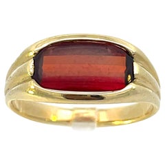 1920 Anello Art Deco in oro giallo con castone incastonato di granato