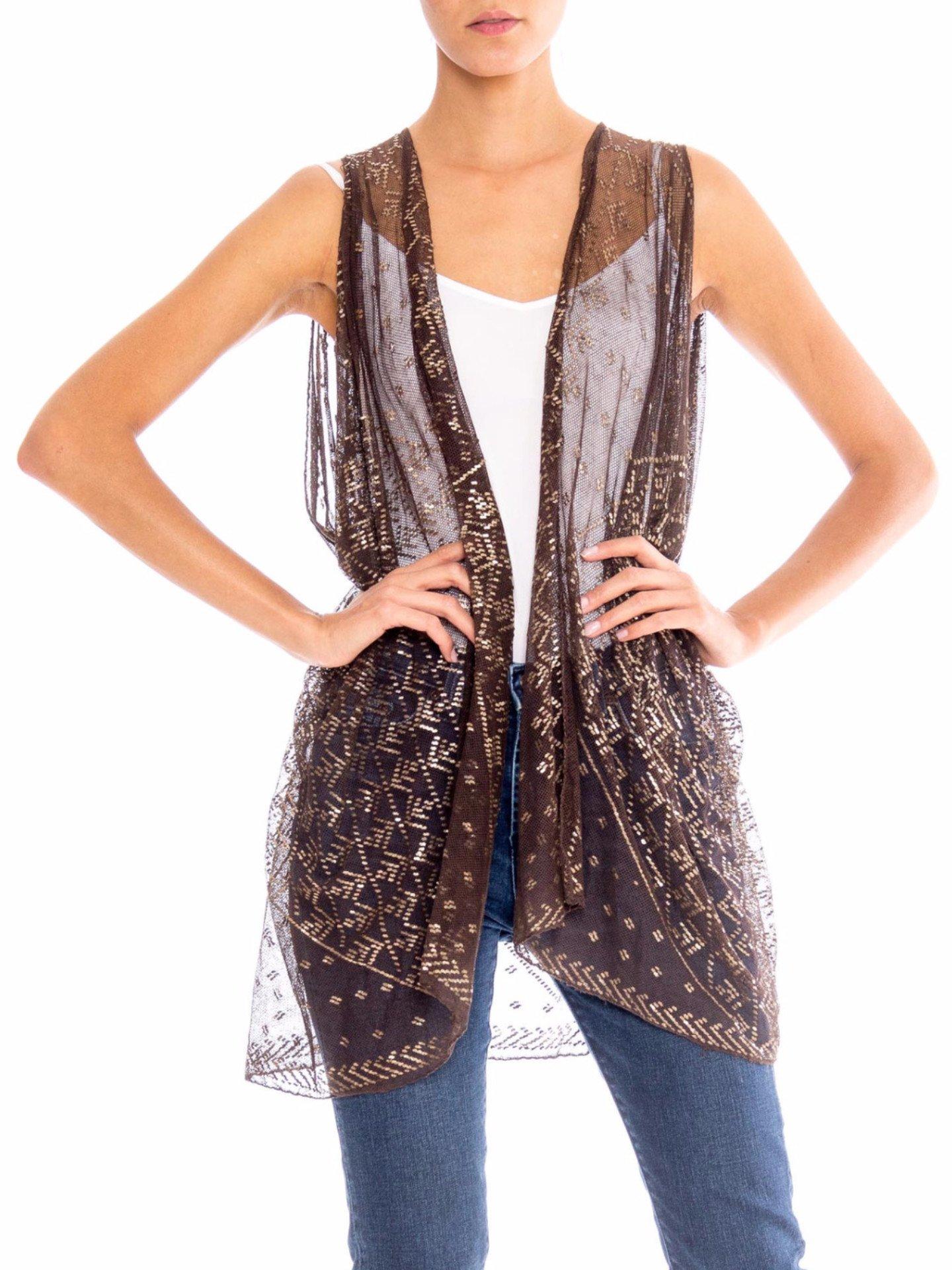 MORPHEW COLLECTION Chocolate Brown & Silver Egyptian Assuit Sheer Draped Vest
MORPHEW COLLECTION is made entirely by hand in our NYC Ateliér of rare antique materials sourced from around the globe. Our sustainable vintage materials represent over a