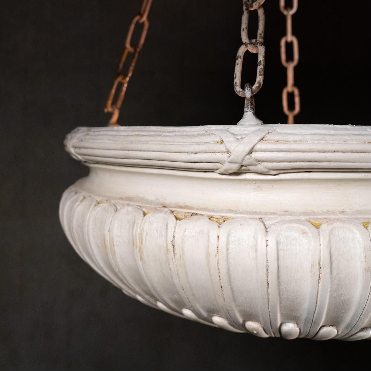 A great set of three large cast plaster chandeliers salvaged from a theatre in Victoria , BC.  
Rewired and very easy set up…lights can be lengthened or shortened.   Great old worn surface with bronze hardware and gilded hi-lites. 

At the turn of