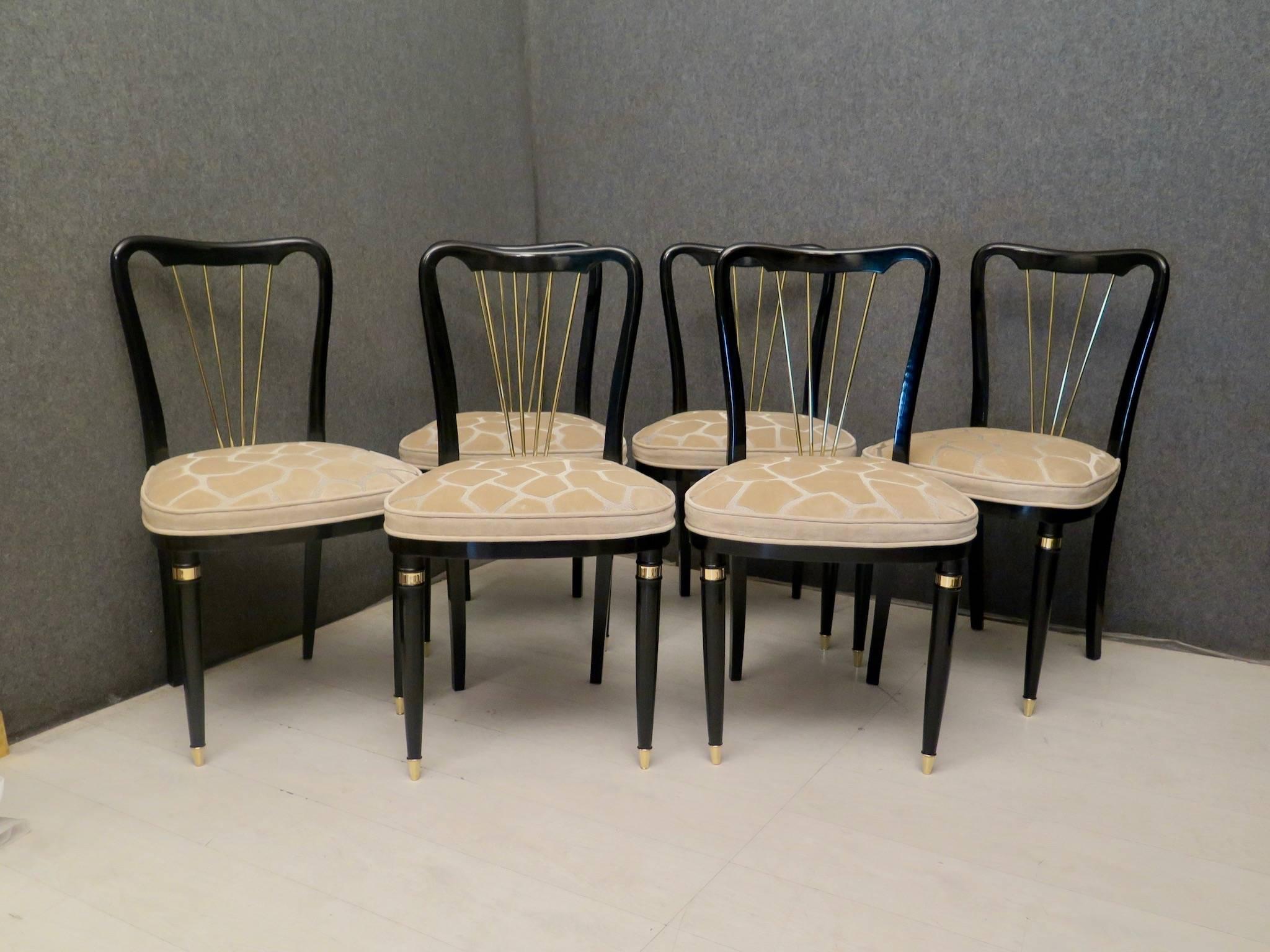 Six French art deco chairs. All well polished in black shellac, with a seat covered in particular 