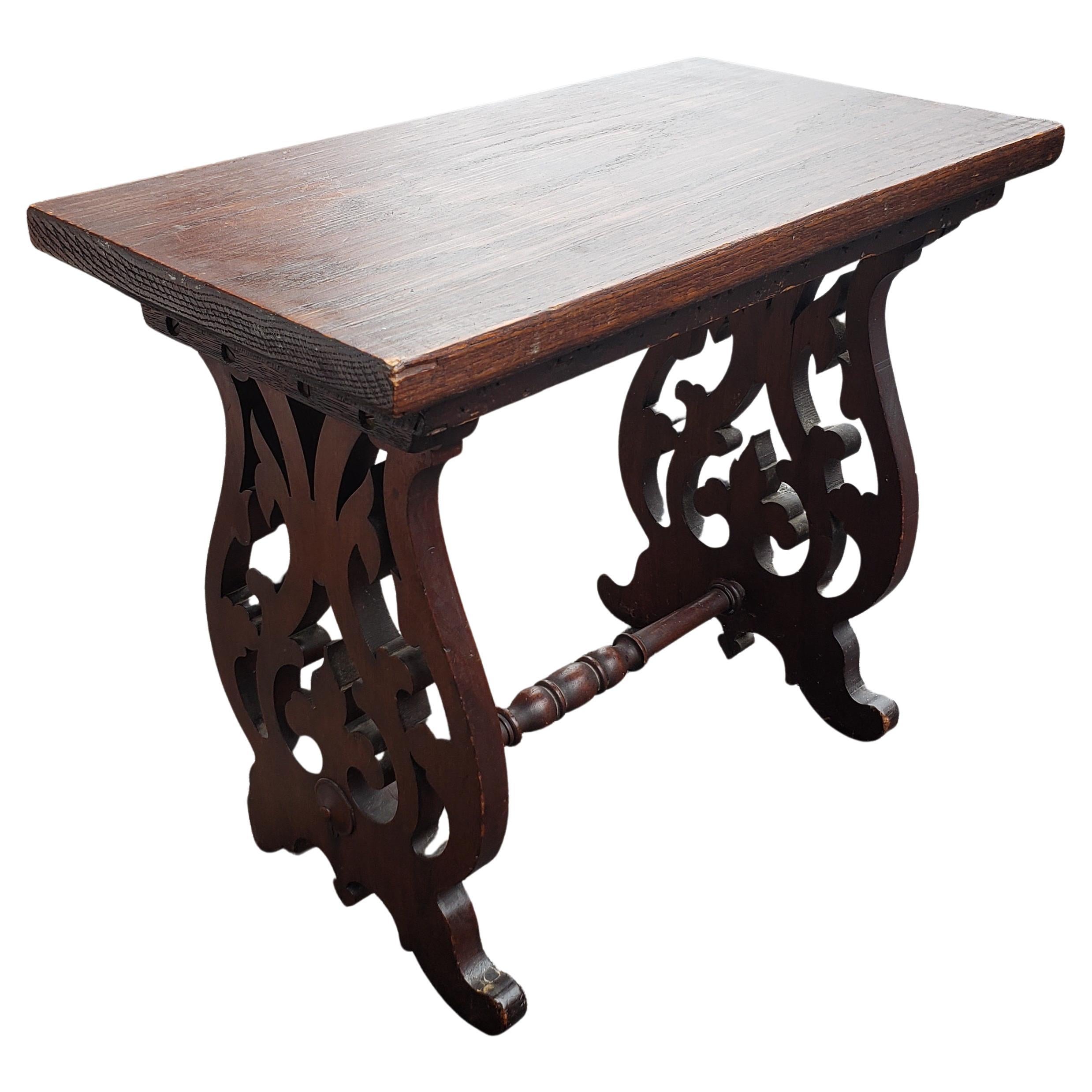 A patinated 1920 Edwardian handcrafted and Carved Oak Trestle Bench or Table. 
Measures22