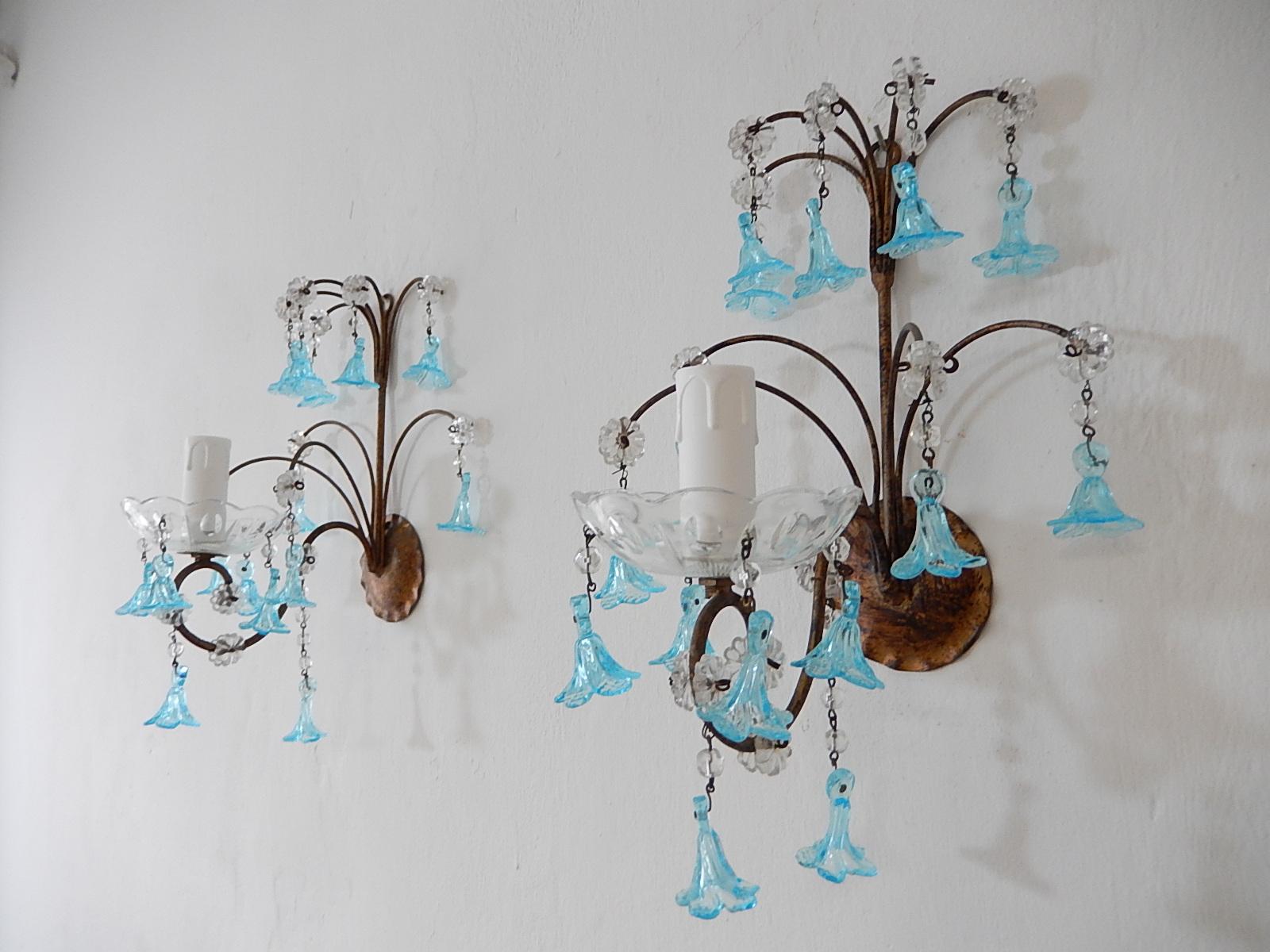Housing one light each sitting in a crystal bobeche dripping with Murano bell flowers in aqua blue. Will be re wired with certified US UL sockets for the USA and appropriate sockets for all other countries and ready to hang. Gilt metal body with