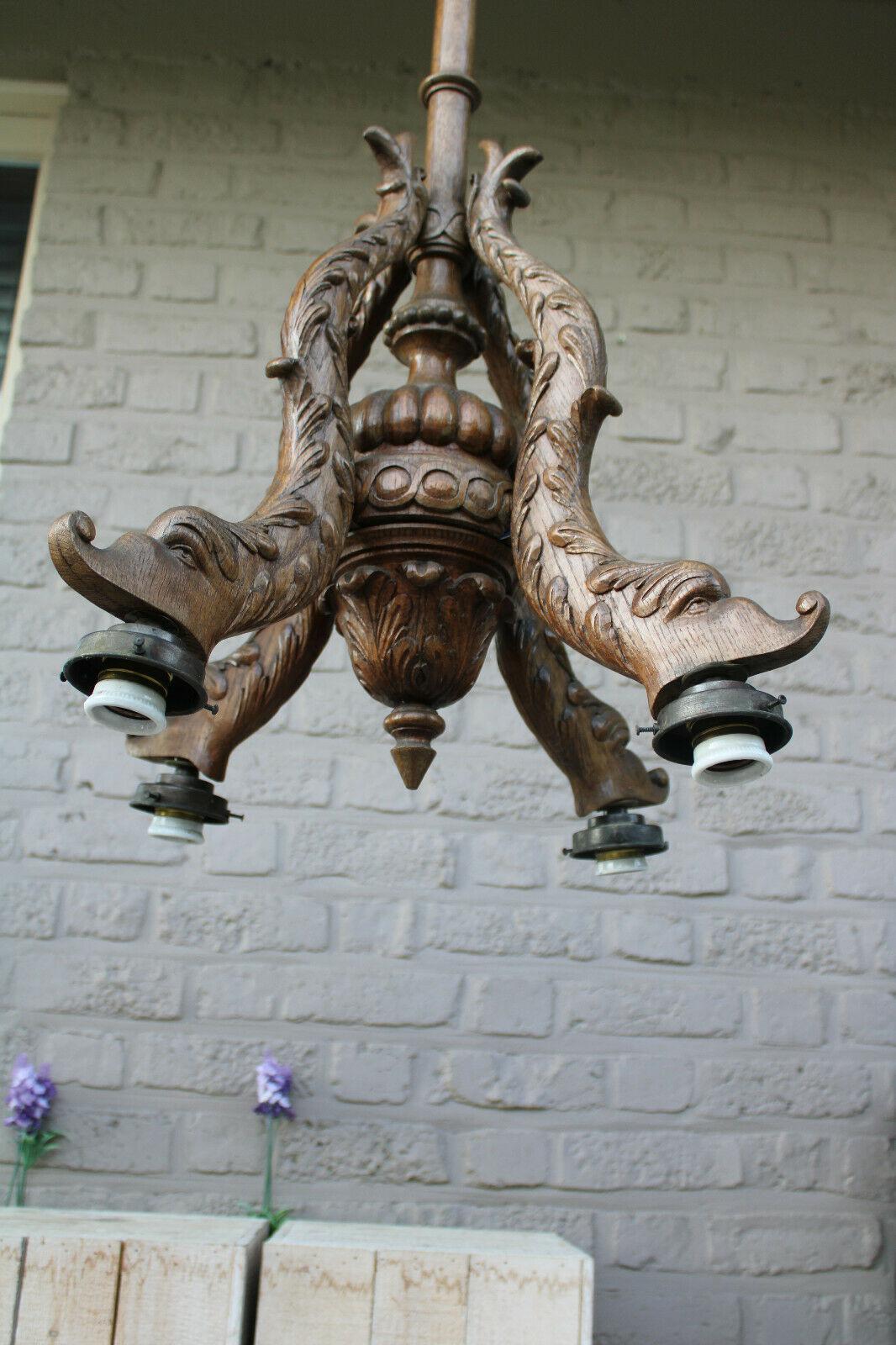 1920 French Art Deco Carved Wood Dolphin/ Koi / Sea Creature 4 Fish Chandelier In Good Condition For Sale In Opa Locka, FL