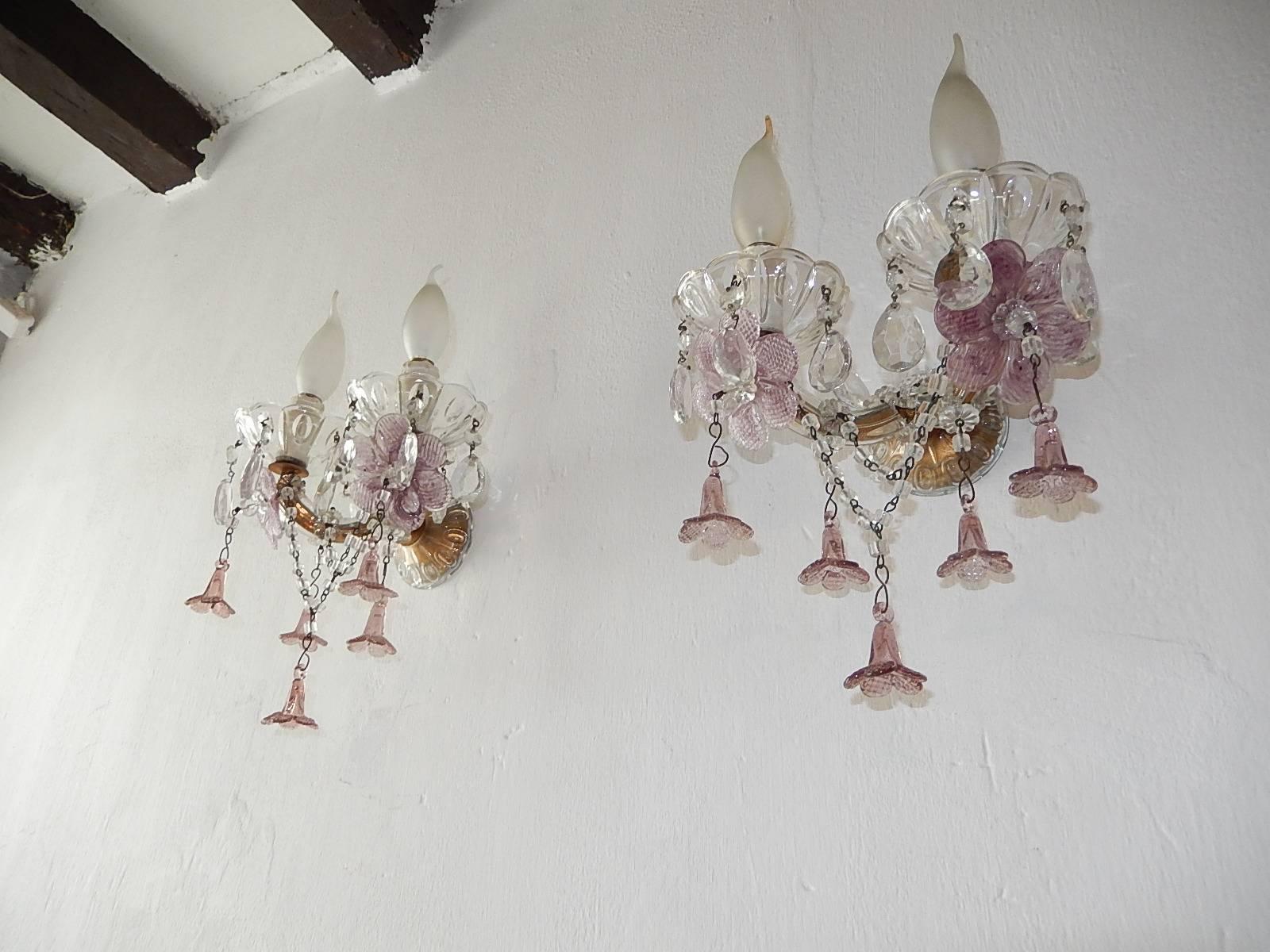 Housing two-light each. Re-wired and ready to hang. Gilt metal arms with Murano glass covering. Adorning rare Murano flowers and swags of crystal. Free priority shipping from Italy.