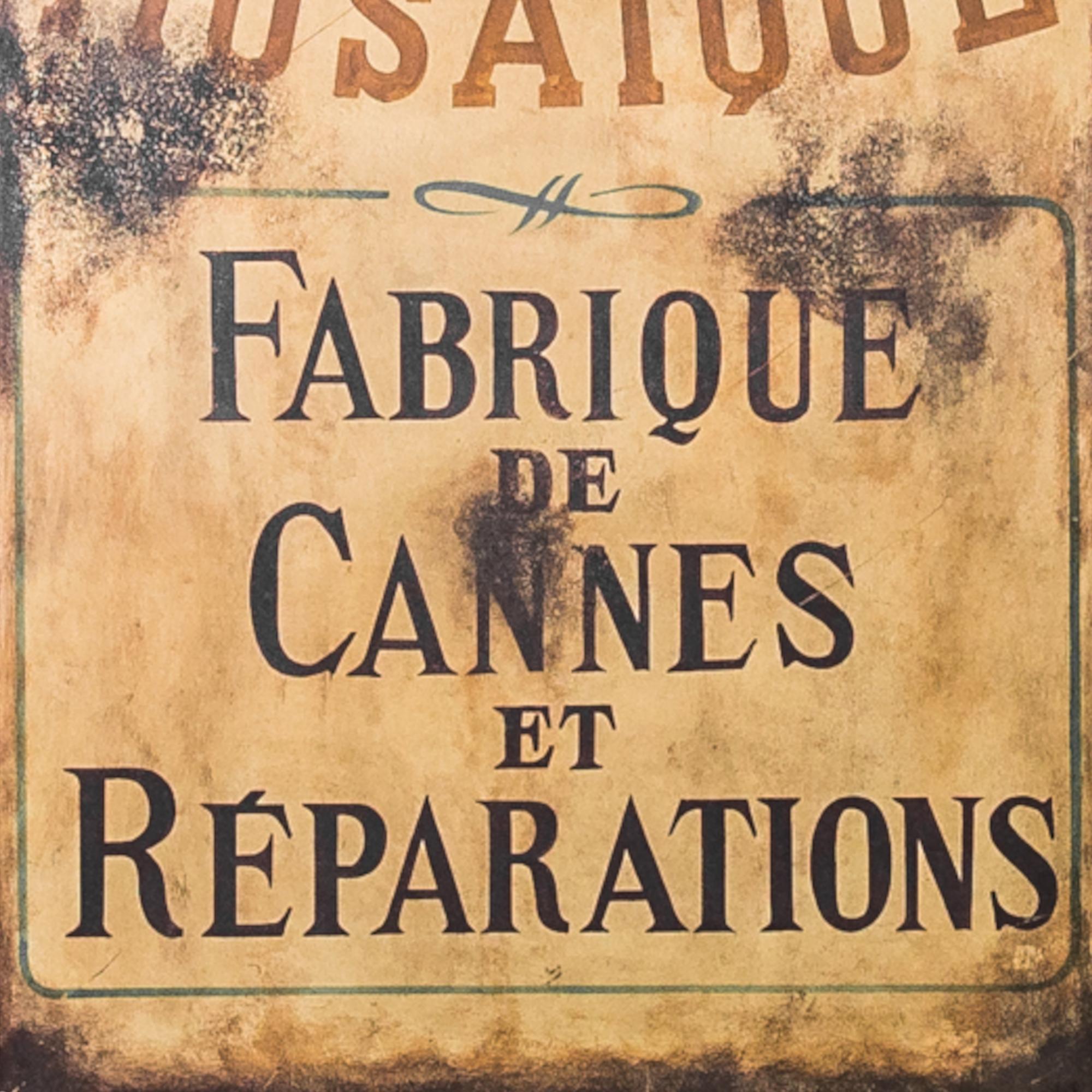 A nostalgic hand painted metal sign made in France, circa 1920. The sign advertises Mr Stiffa’s Canes Factory, a little shop where the attentive craftsman would repair or manufacture the perfect walking cane out of olive wood. A delightful