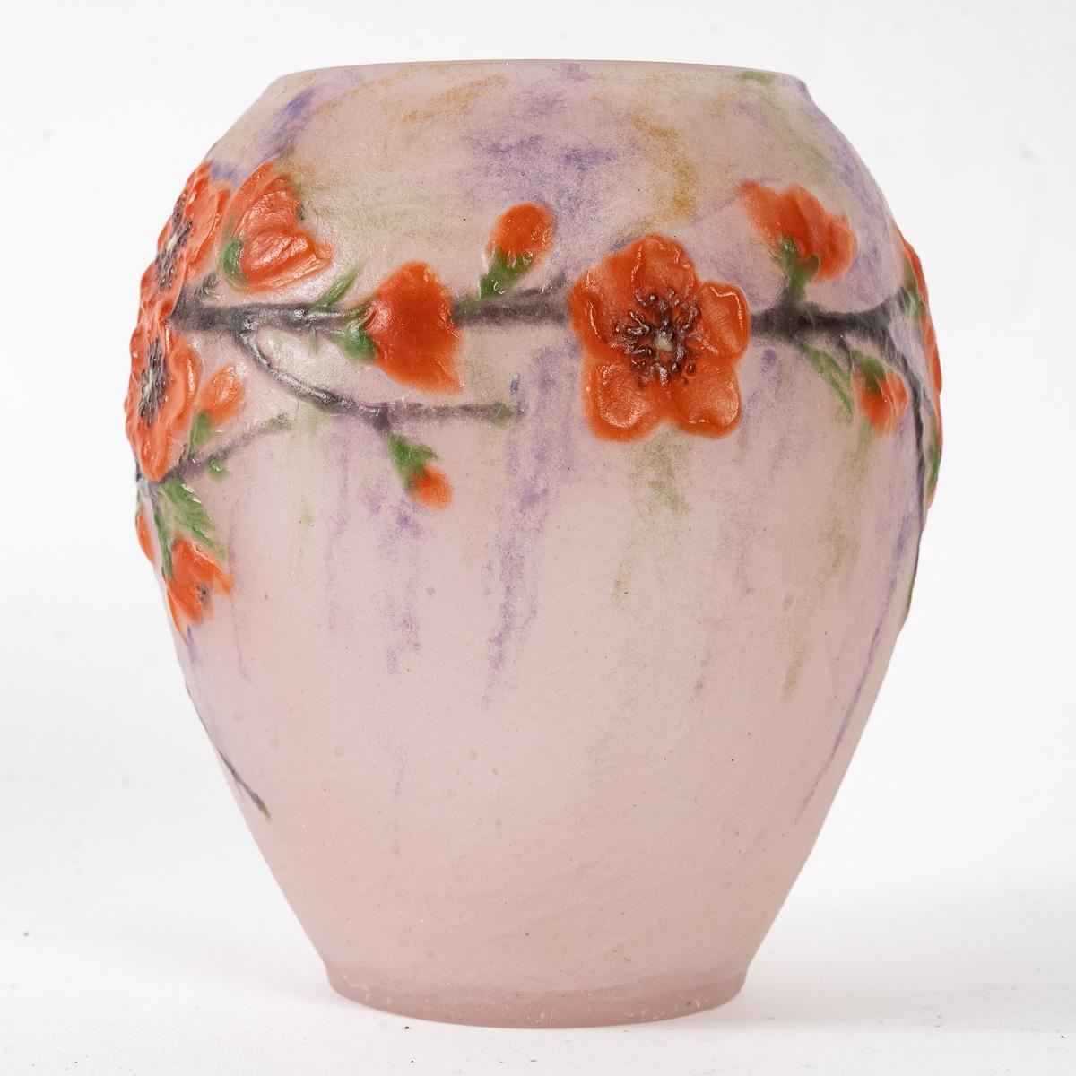 Vase “Fleurs de Pechers” (Peach Blossom) made in coral, green, black and purple glass pate de verre by Gabriel Argy-Rousseau in 1920.
Molded signature.

Perfect condition. Sublime colors and extremely rare model.

Height: 14 cm

Janine