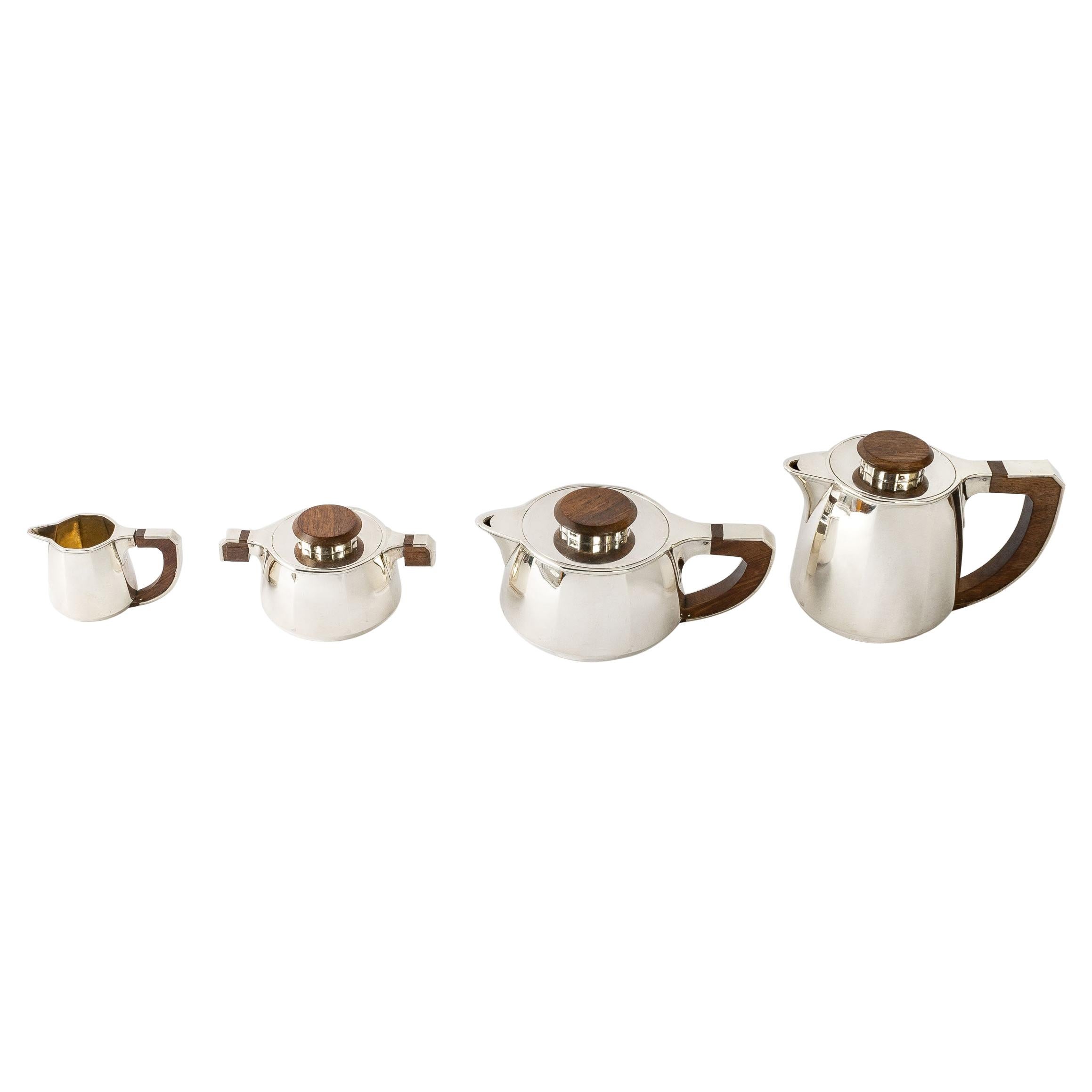 1920 Jean E. Puiforcat, Tea and Coffee Set in Sterling Silver and Rosewood