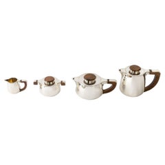 1920 Jean E. Puiforcat, Tea and Coffee Set in Sterling Silver and Rosewood