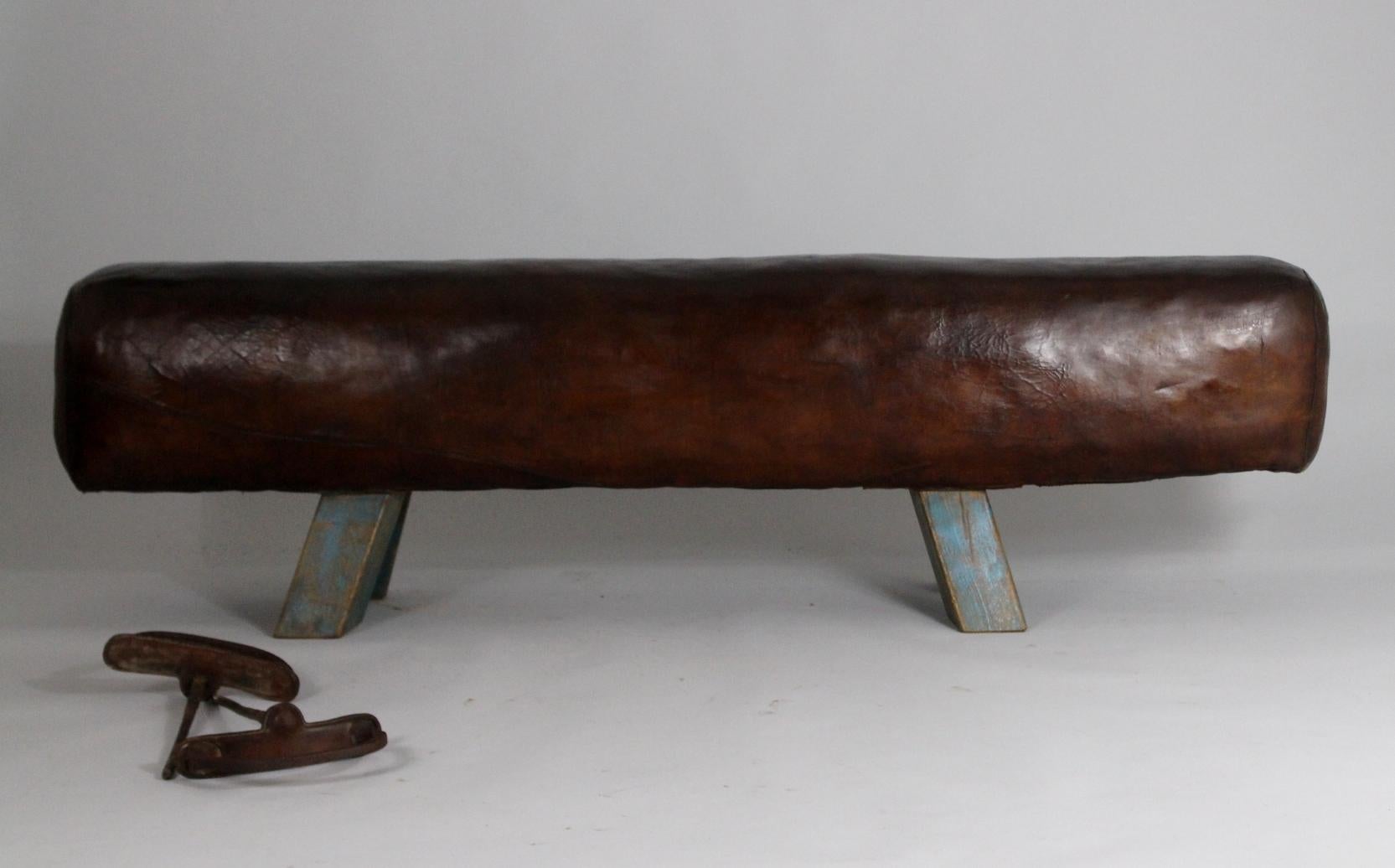 Old leather gym pommel horse with iron handles. Good original condition with patina.