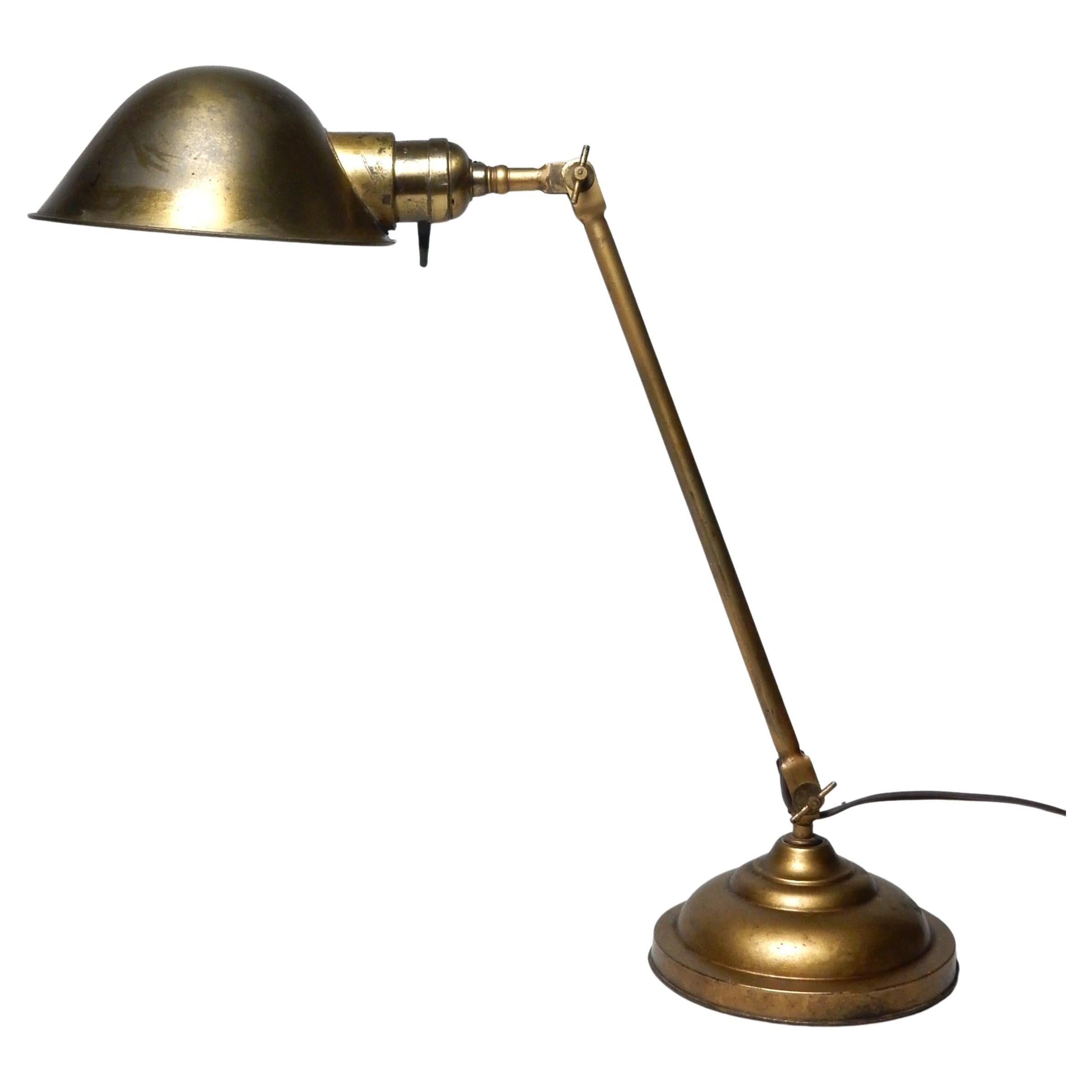 Own an original, not a cheap reproduction....
This, a circa 1920 Faries adjustable desk lamp.
All original except cord and in perfect working order.
Adjusting clamps work as they should.
6-1/2