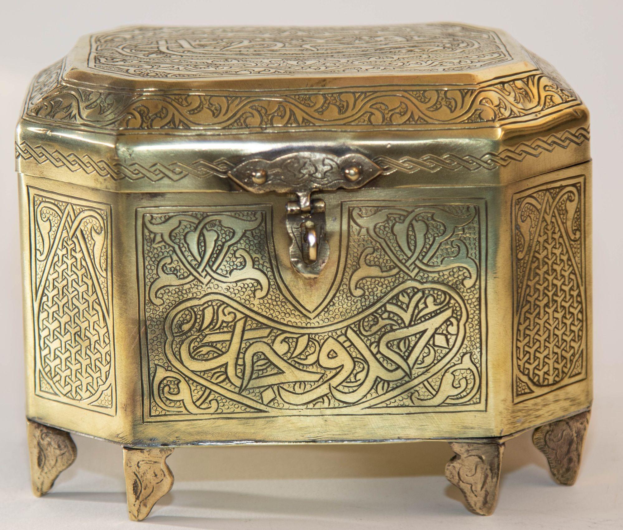 Antique Persian Islamic Brass Jewelry Footed Box in Mamluk Revival Damascene style.
A Middle Eastern Moorish Damascene Brass Box circa 1910-1920s.
A fine antique handcrafted etched hammered Syrian Damascene brass jewelry box.
Octagonal shape lidded