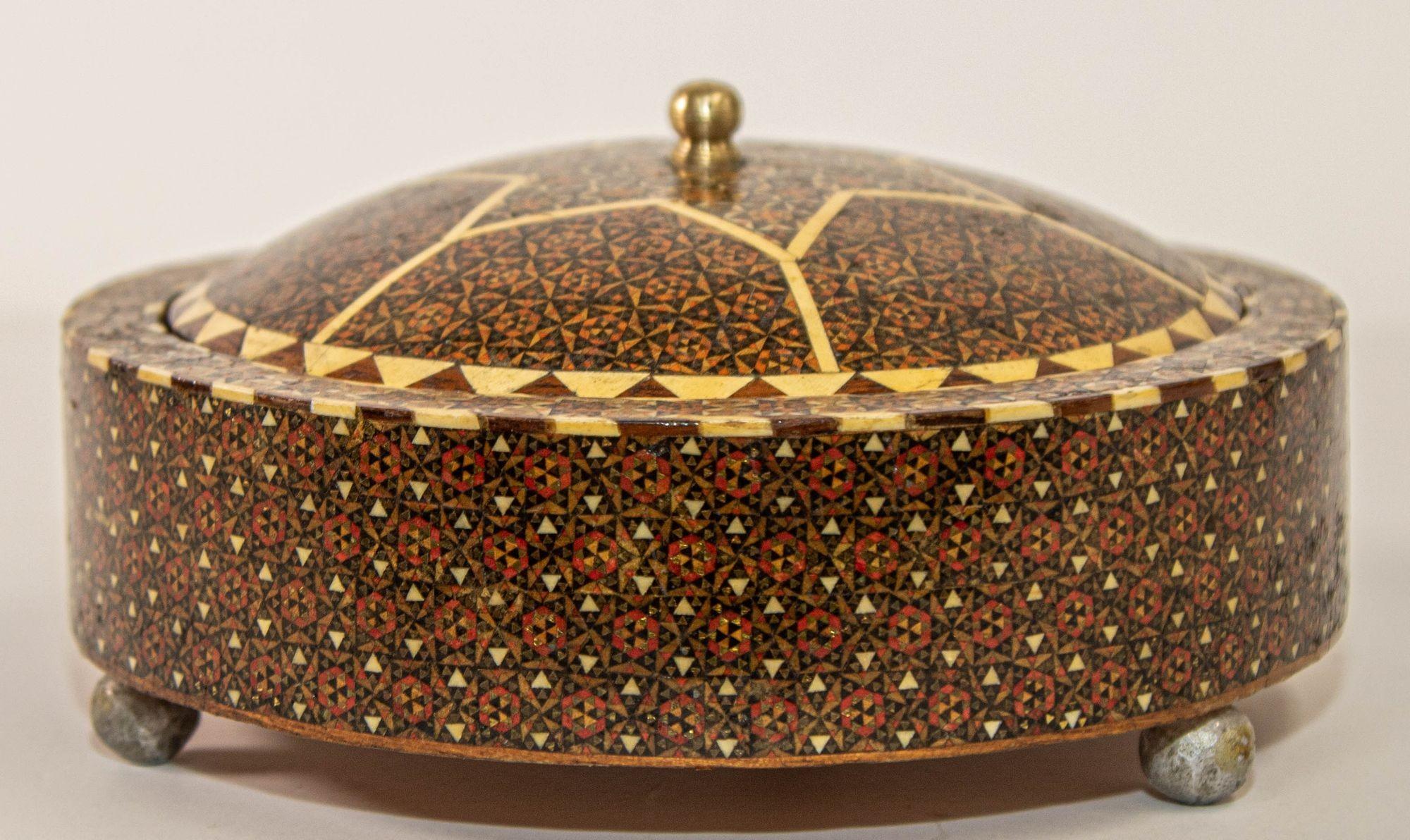 Late 19th c. early 20th c. Persian Footed Wooden Round Jewelry Box.
Antique rare in round shape large Persian wooden box with marquetry called 