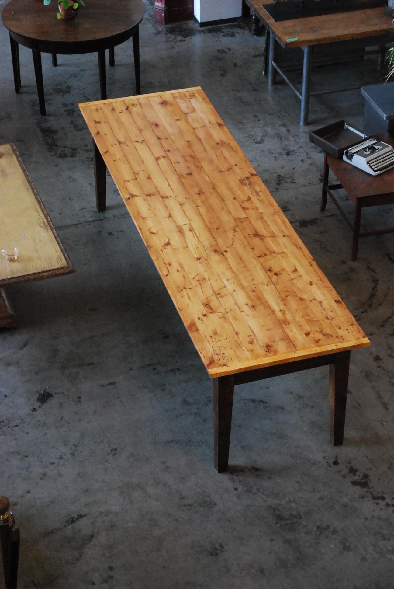 This is a 10 ft country style convent table with 8 drawers and a centre leg for support. 
The skirt retains an old age crack finish with solid contruction. Depth from floor to skirt is 24