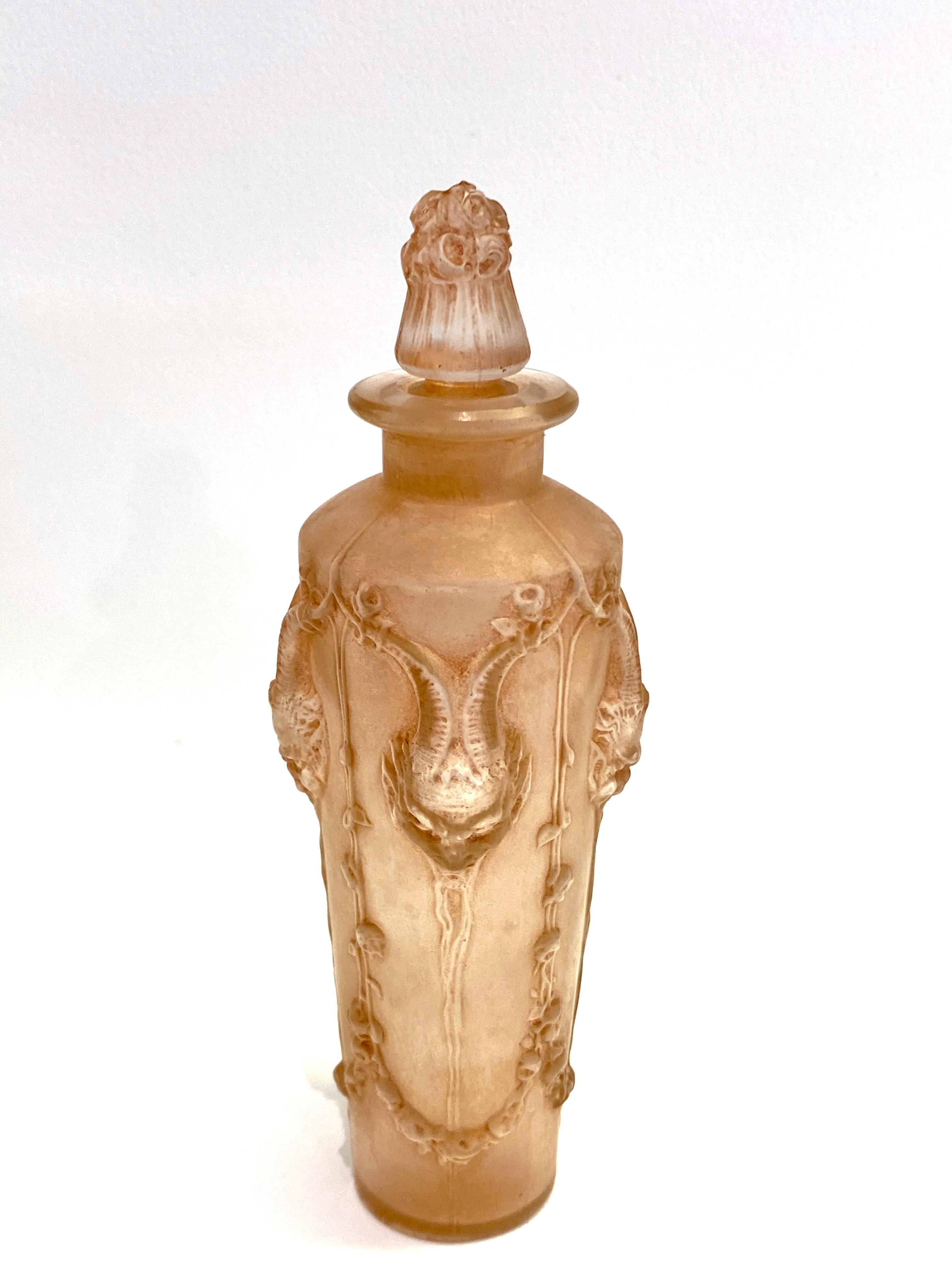 Molded 1920 René Lalique Pan Perfume Bottle Frosted Glass with Sepia Patina, Satyres