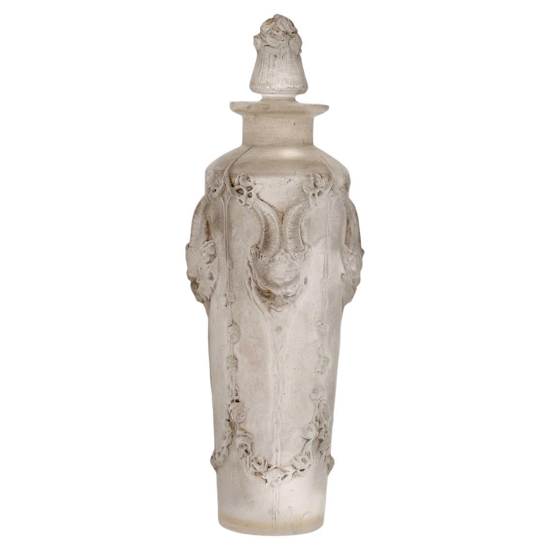 1920 René Lalique Perfume Bottle Pan Satyres Glass with Grey Patina For Sale