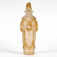 1920 René Lalique Bottiglia di profumo in vetro Pan Satyres con patina seppia